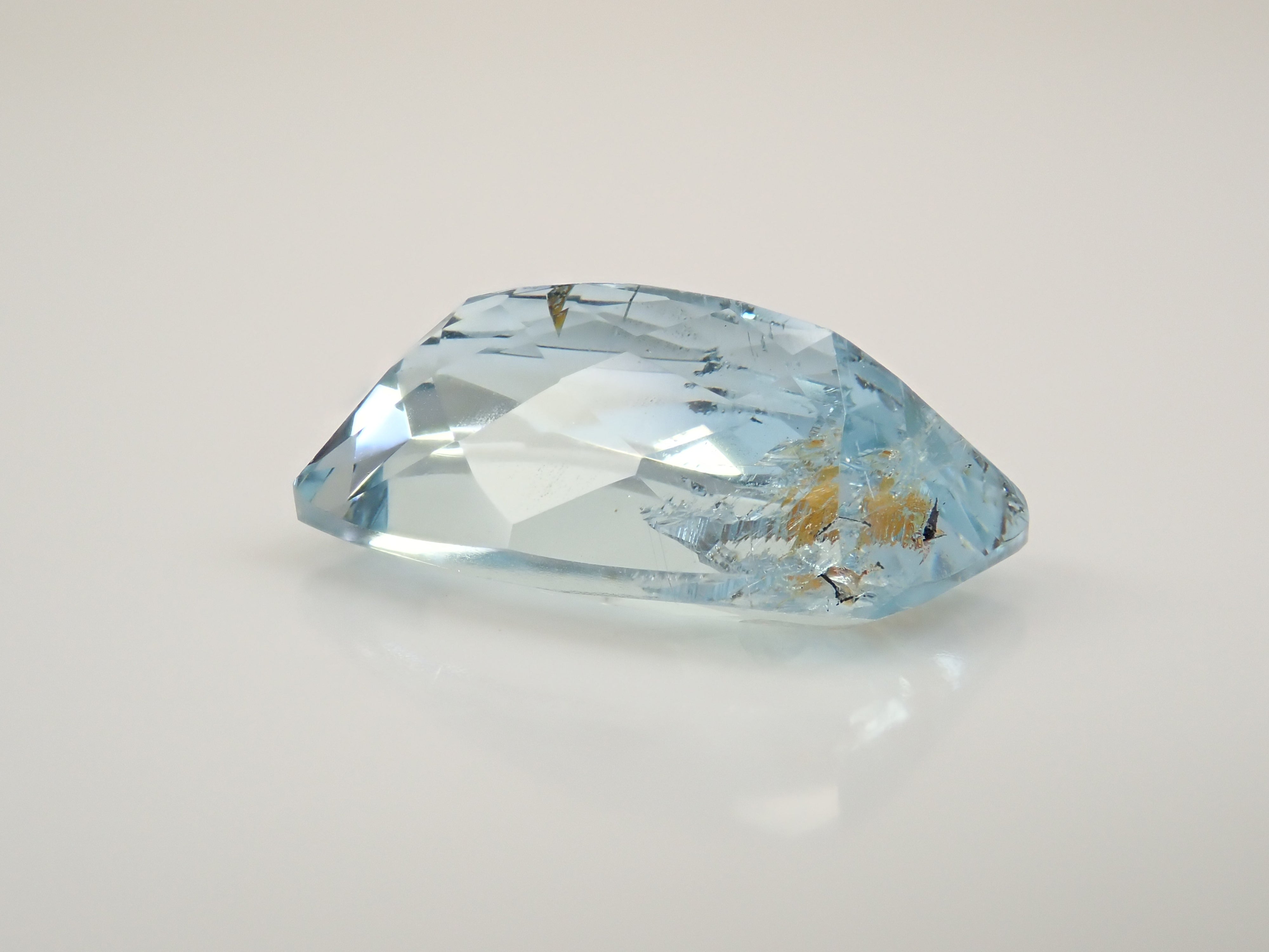 【12562025掲載】ブラジル産ライモナイトインブルートパーズ 6.701ctルース