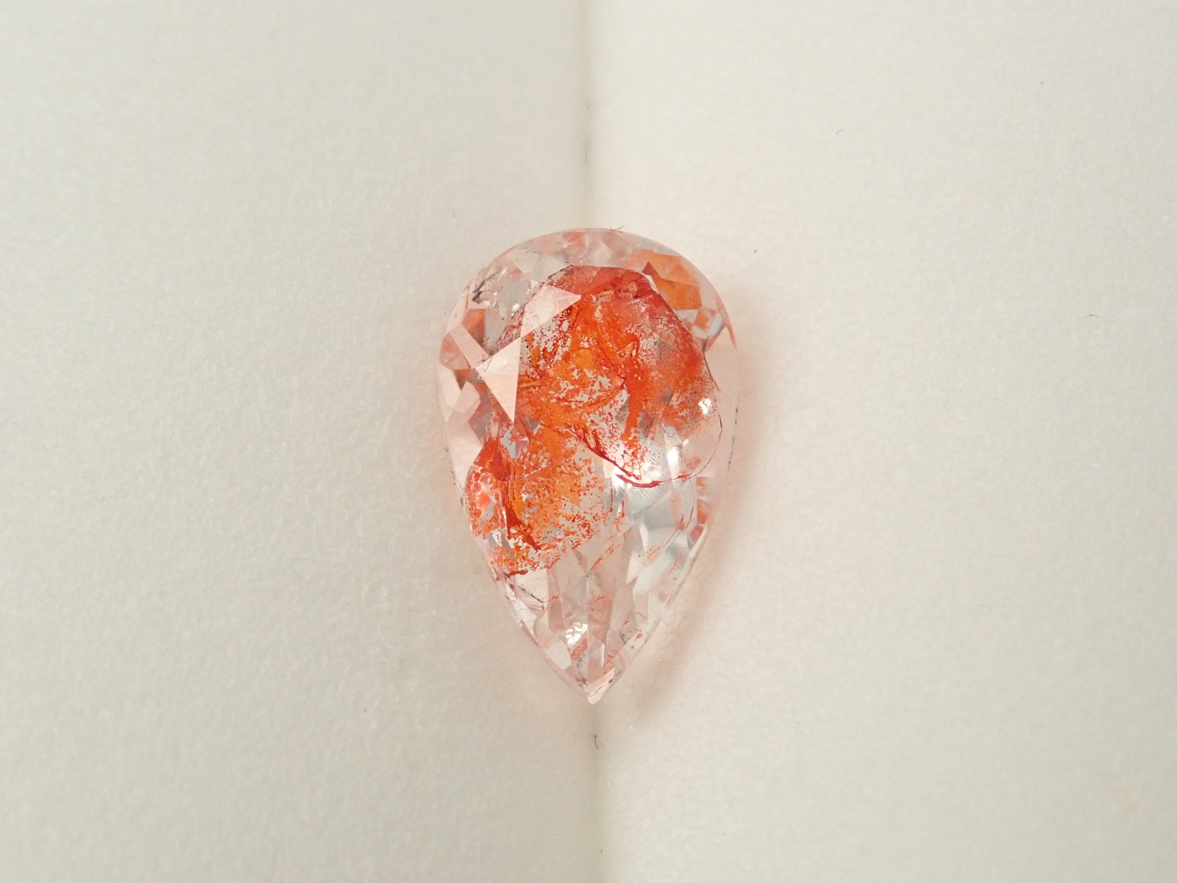 【12562074掲載】ブラジル産ライモナイトインクォーツ（オーロラクォーツ） 1.894ctルース