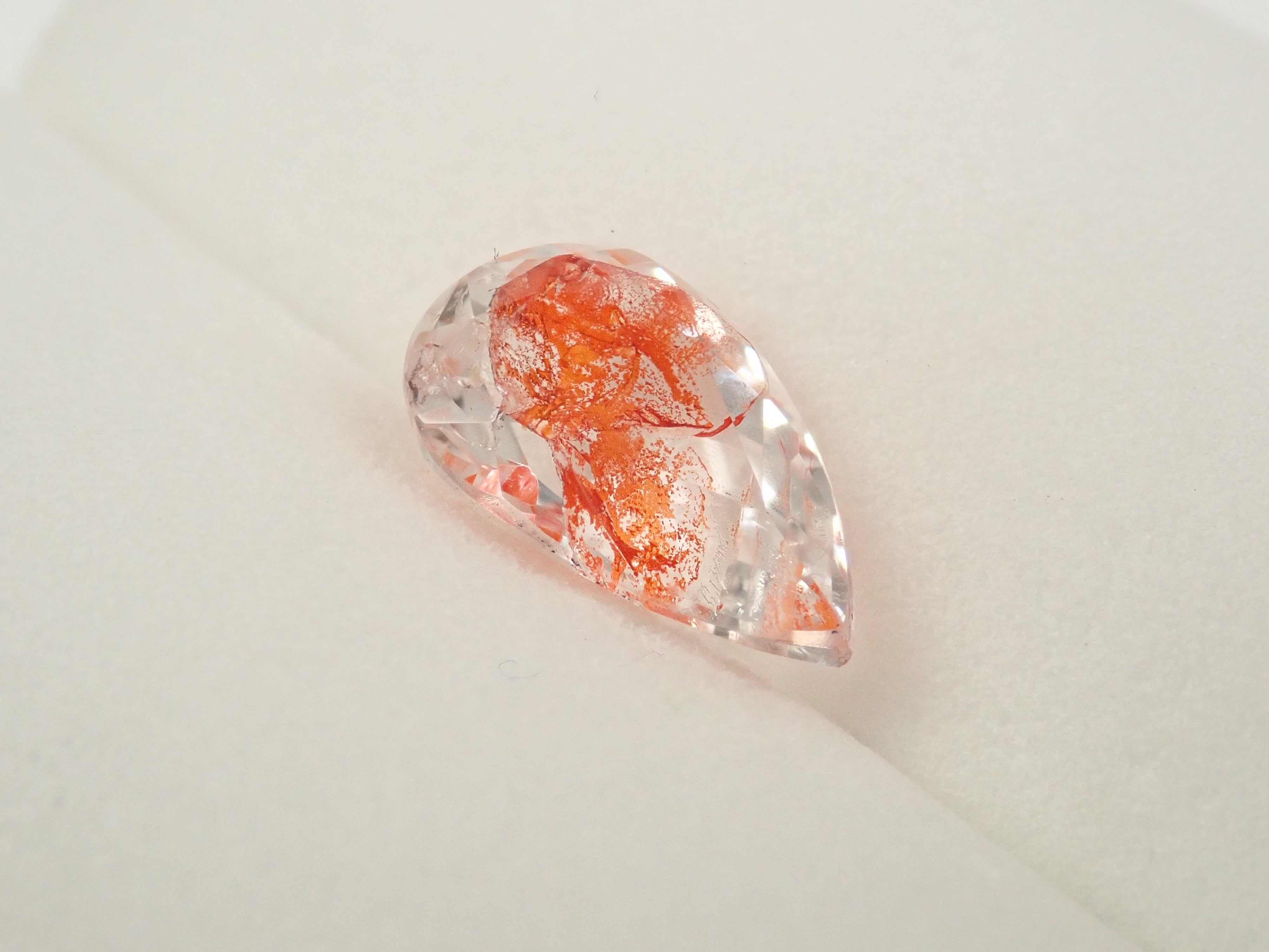 【12562074掲載】ブラジル産ライモナイトインクォーツ（オーロラクォーツ） 1.894ctルース