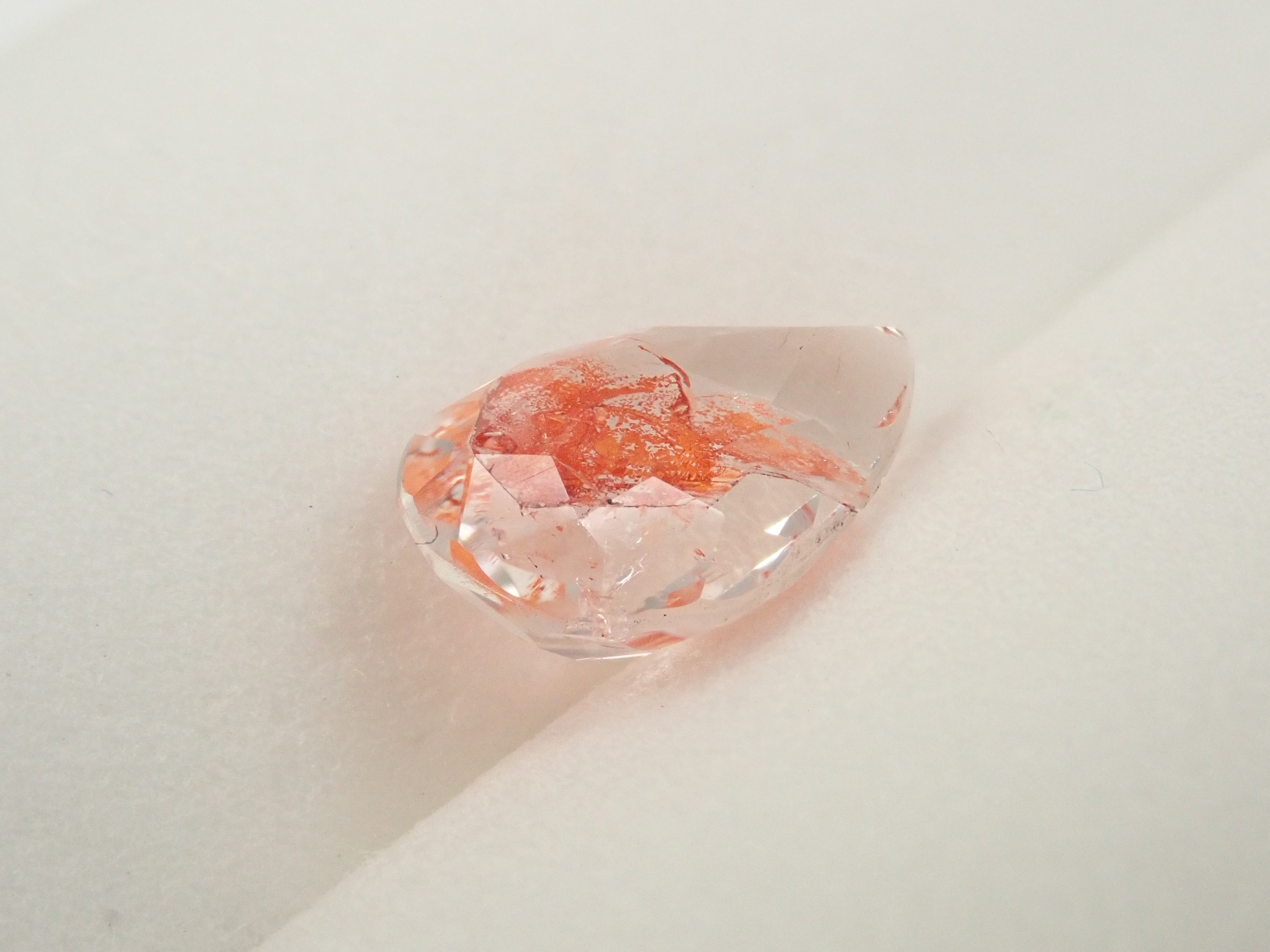 【12562074掲載】ブラジル産ライモナイトインクォーツ（オーロラクォーツ） 1.894ctルース