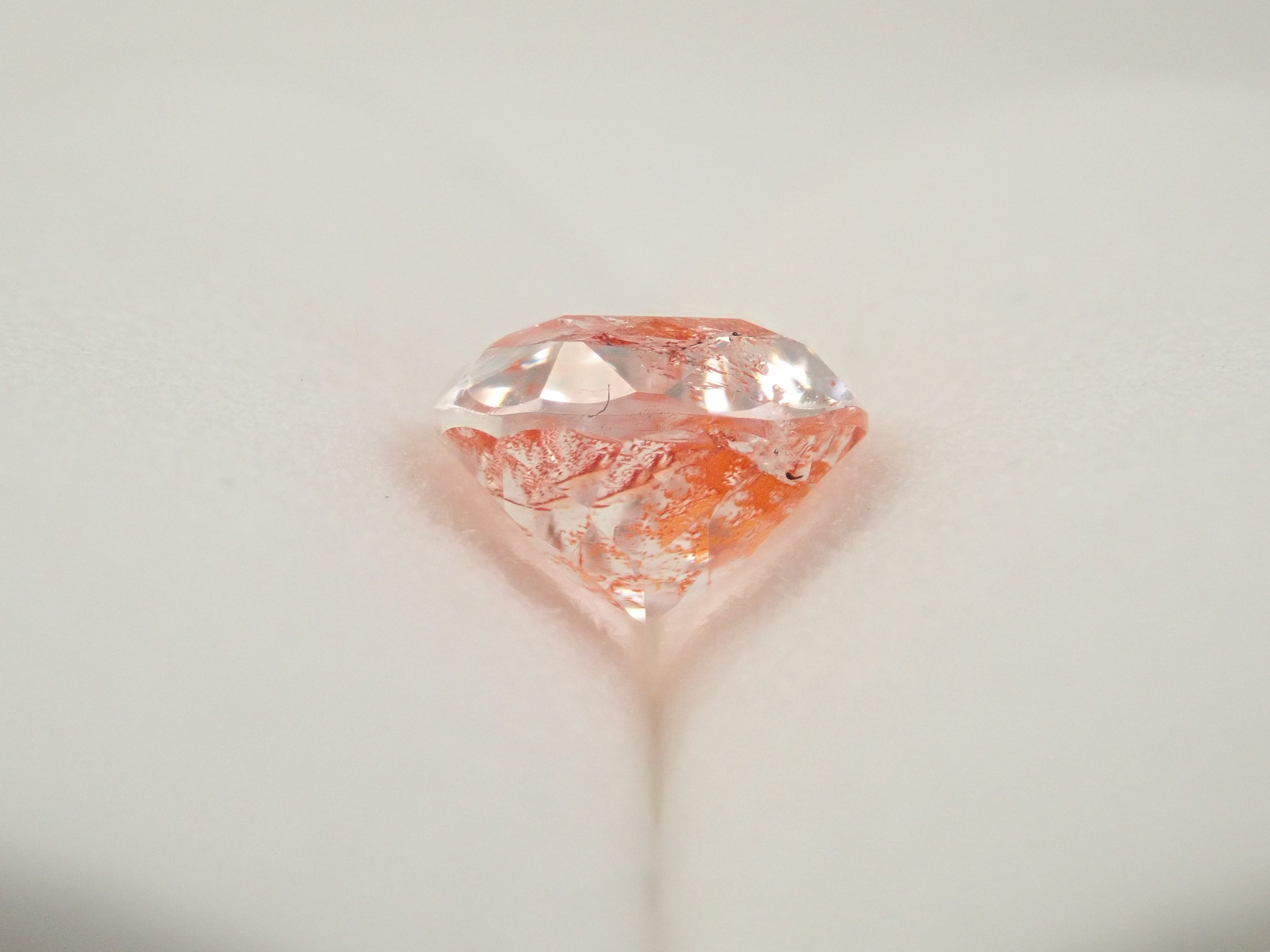 【12562074掲載】ブラジル産ライモナイトインクォーツ（オーロラクォーツ） 1.894ctルース