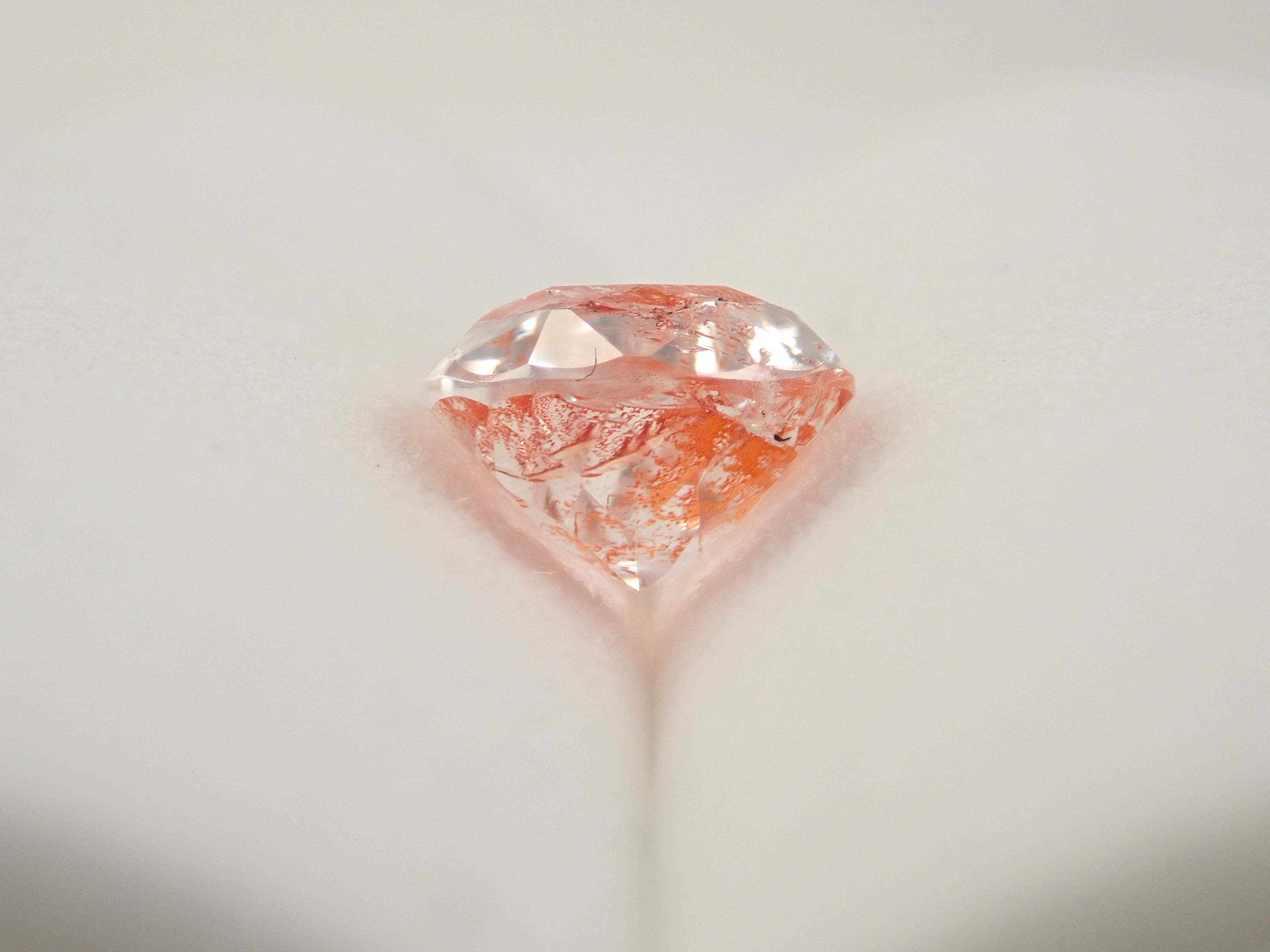 【12562074掲載】ブラジル産ライモナイトインクォーツ（オーロラクォーツ） 1.894ctルース