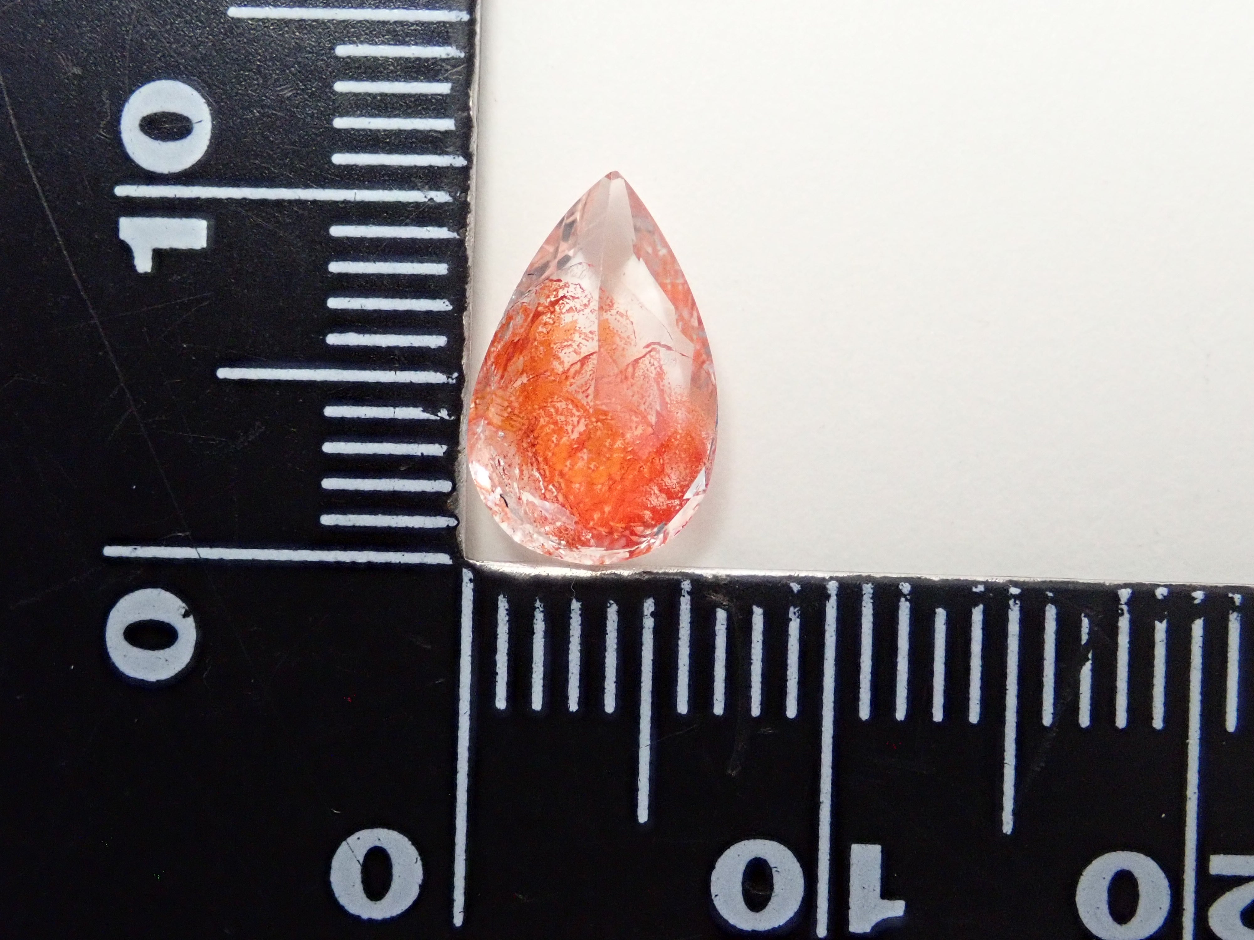 【12562074掲載】ブラジル産ライモナイトインクォーツ（オーロラクォーツ） 1.894ctルース