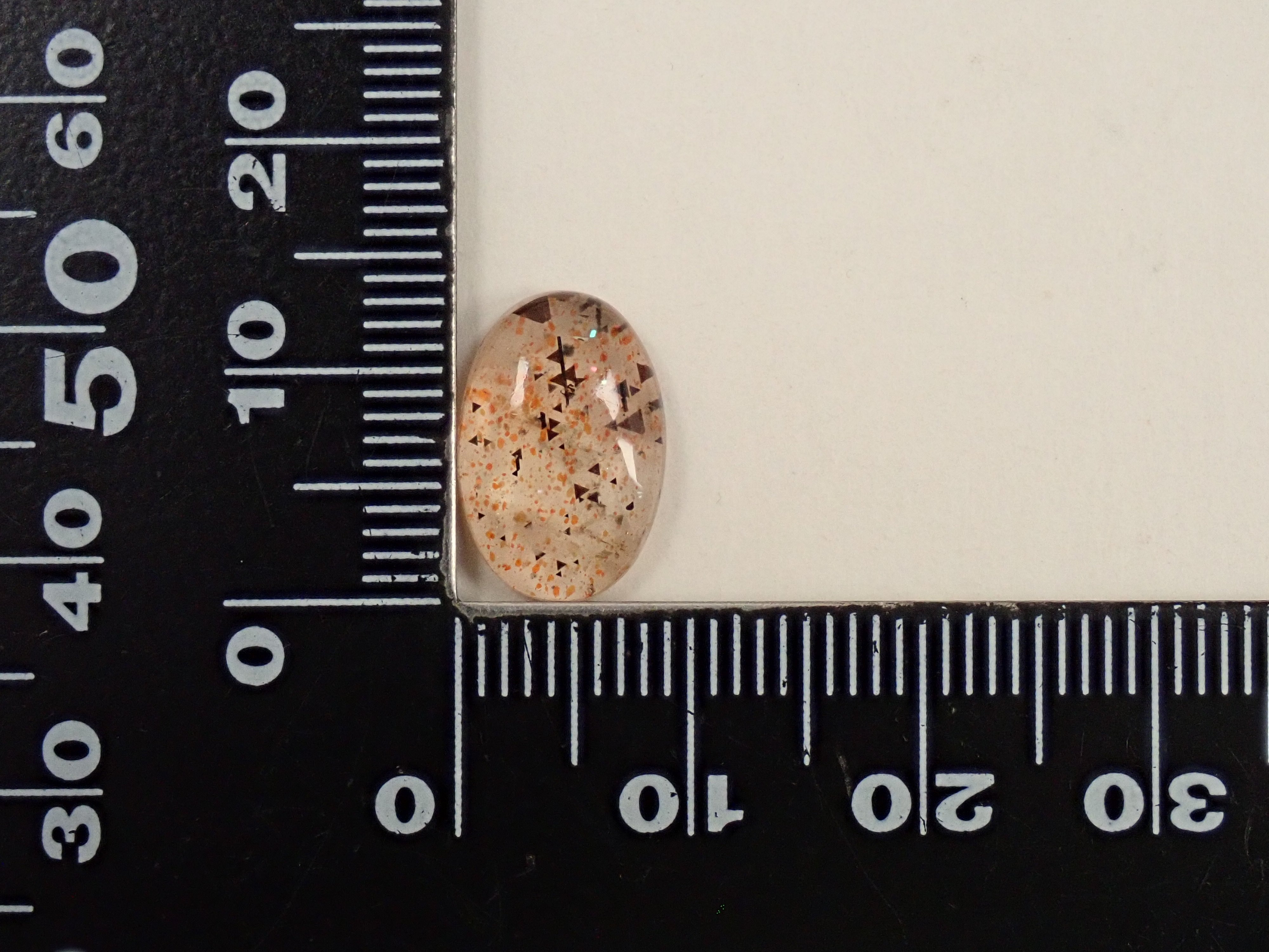 【12562047掲載】オーストラリア産レインボーラティスサンストーン 3.504ctルース