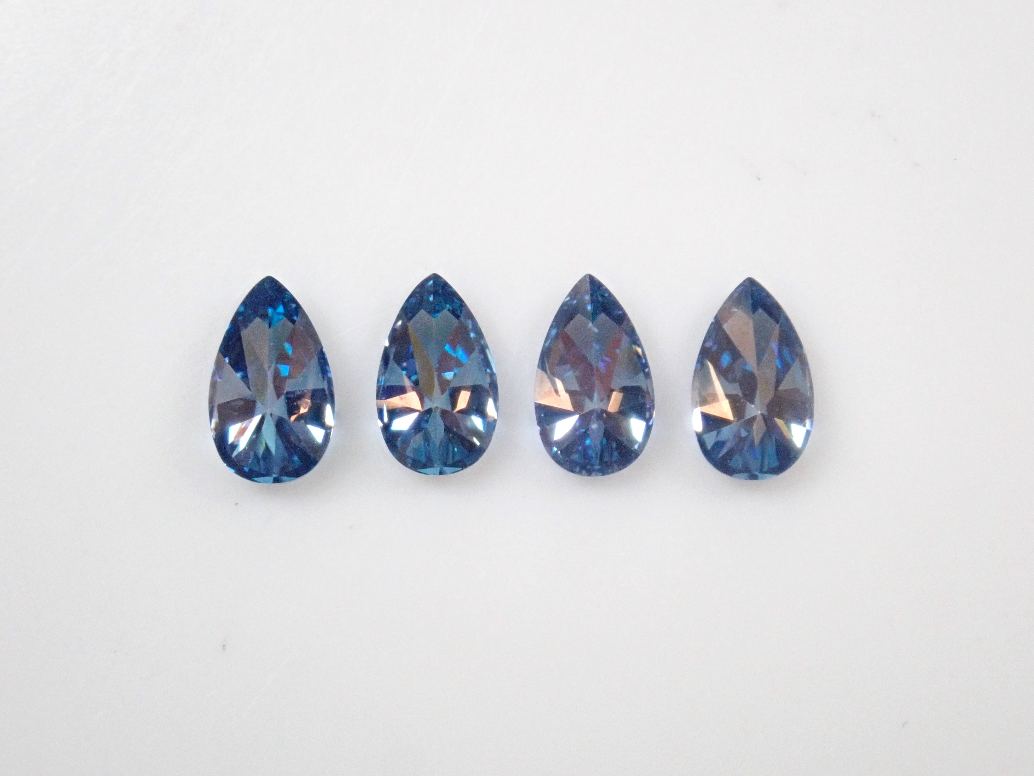 Limited to 4 stones: 1 synthetic moissanite loose stone (blue moissanite, pear shape, 3 x 5 mm) Multiple purchase discounts available