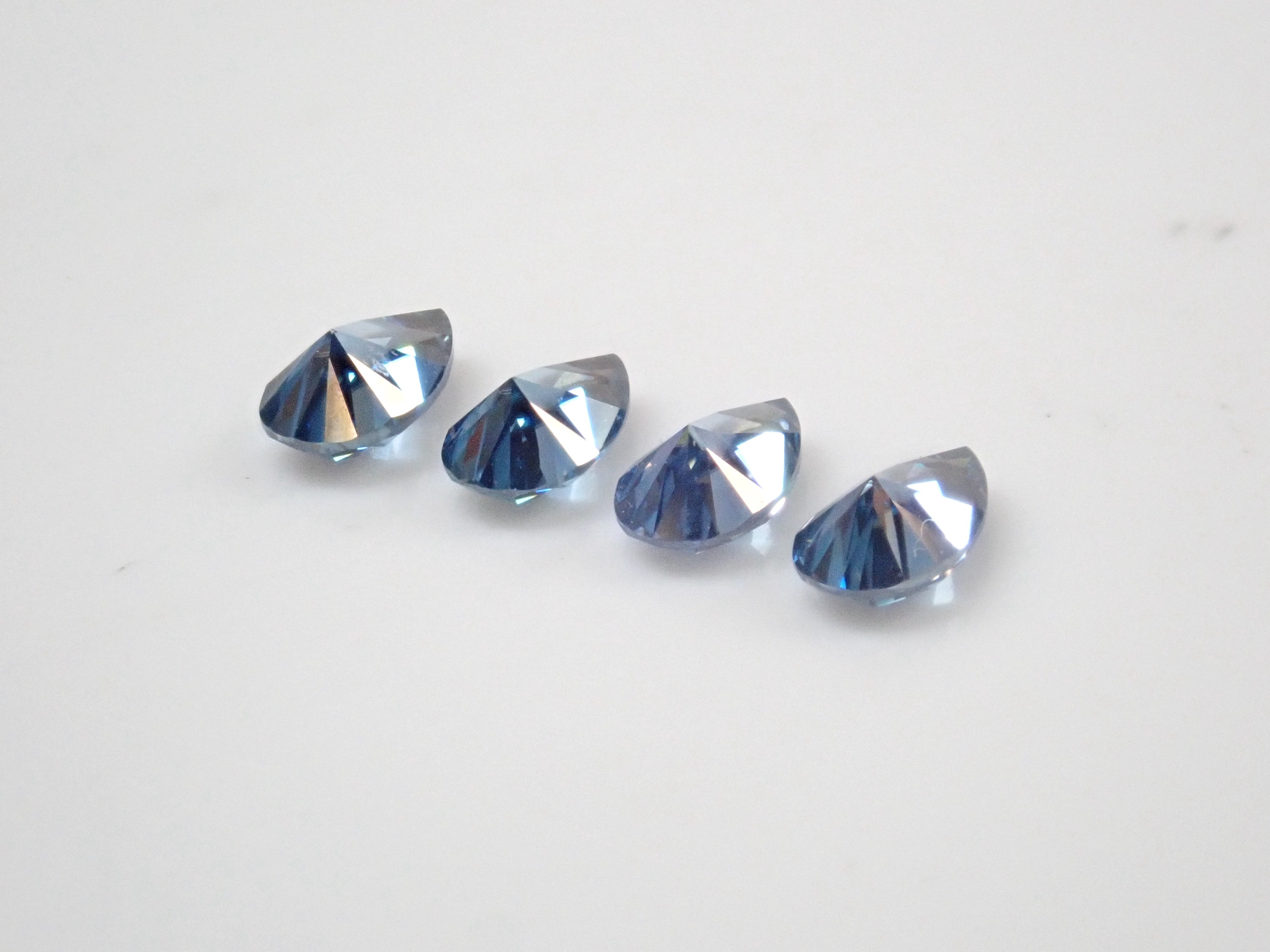 Limited to 4 stones: 1 synthetic moissanite loose stone (blue moissanite, pear shape, 3 x 5 mm) Multiple purchase discounts available