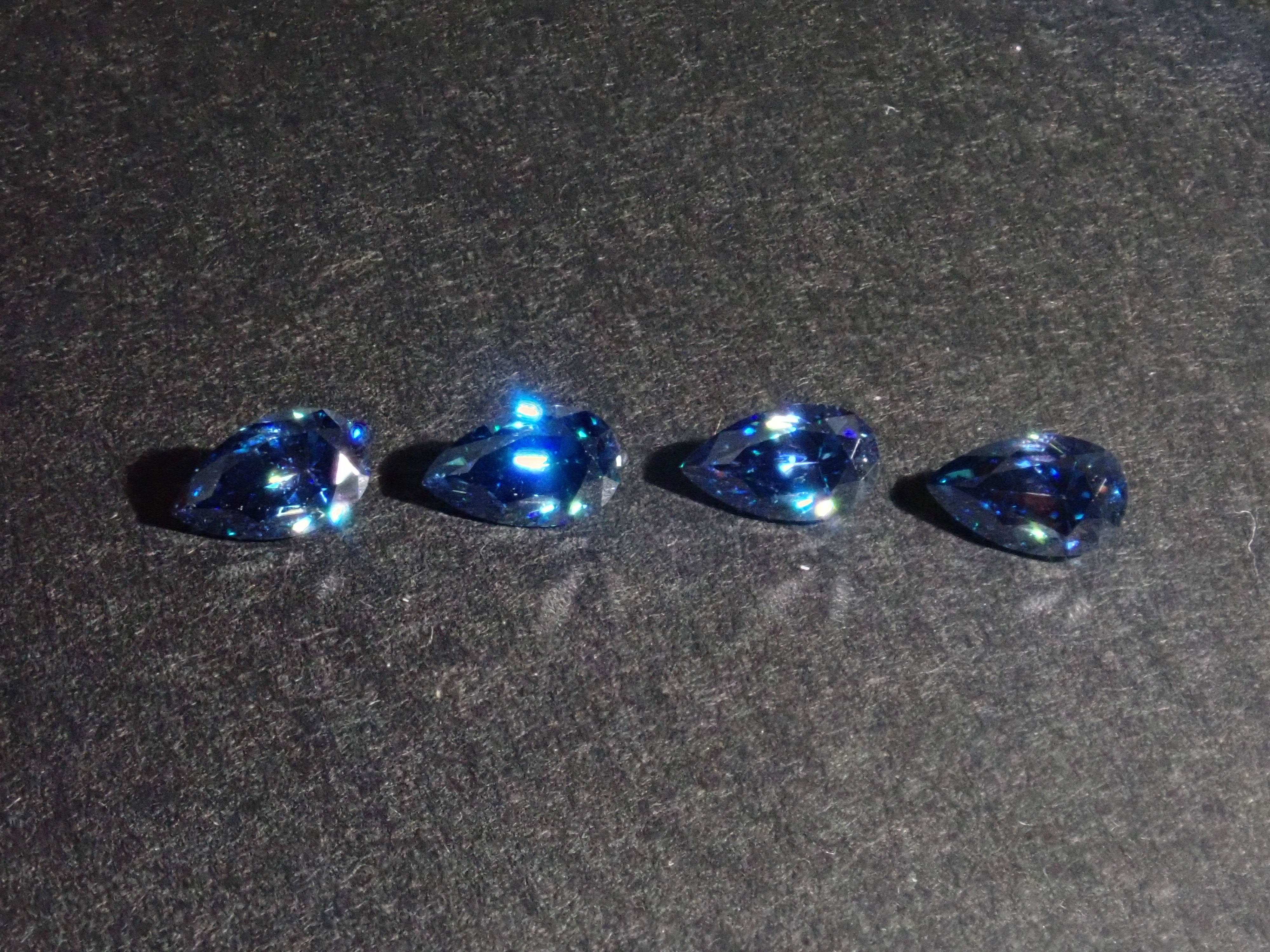 Limited to 4 stones: 1 synthetic moissanite loose stone (blue moissanite, pear shape, 3 x 5 mm) Multiple purchase discounts available