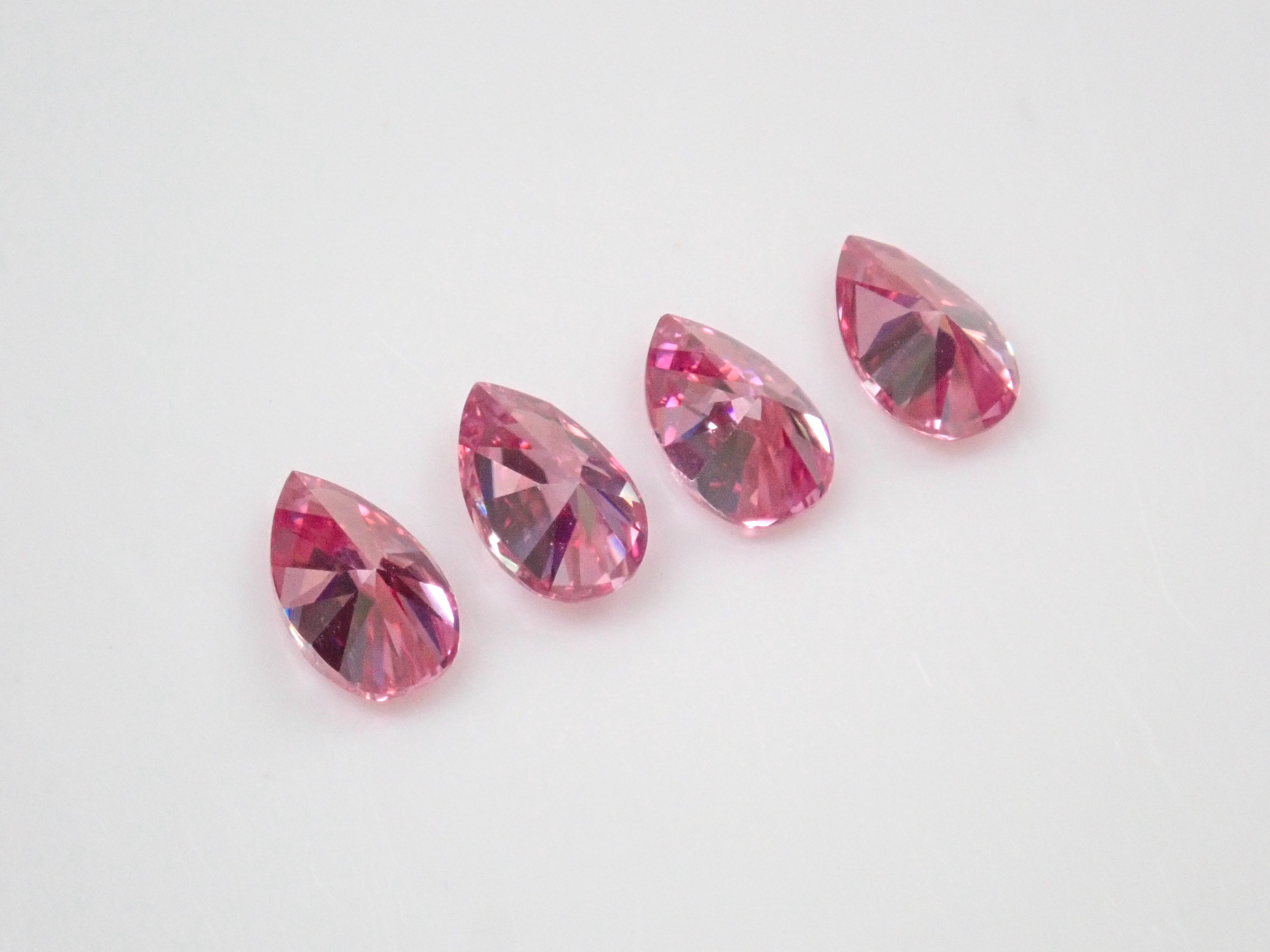 Limited to 4 stones: 1 synthetic moissanite loose stone (pink moissanite, pear shape, 3 x 5 mm) Multiple purchase discounts available