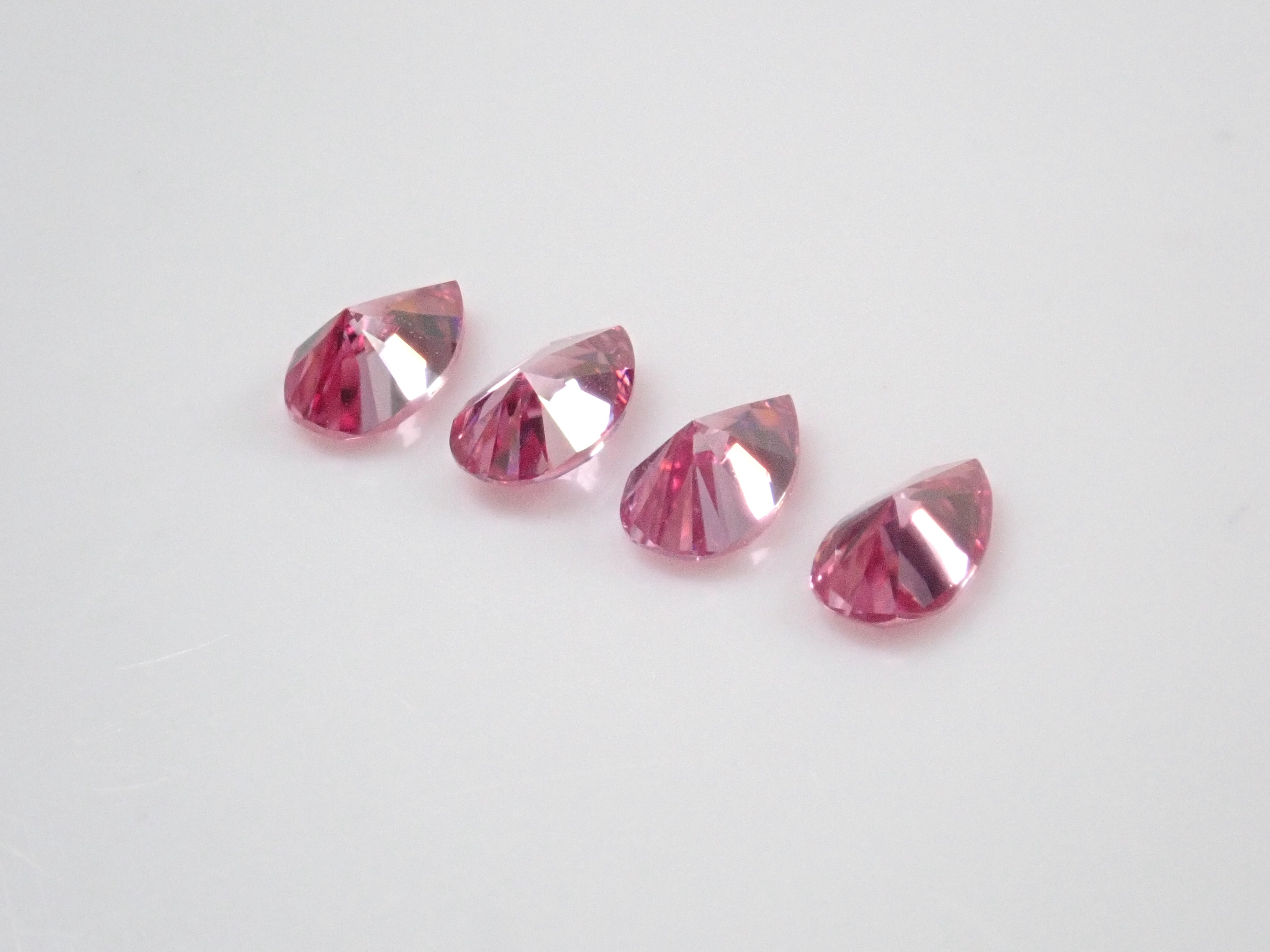 Limited to 4 stones: 1 synthetic moissanite loose stone (pink moissanite, pear shape, 3 x 5 mm) Multiple purchase discounts available