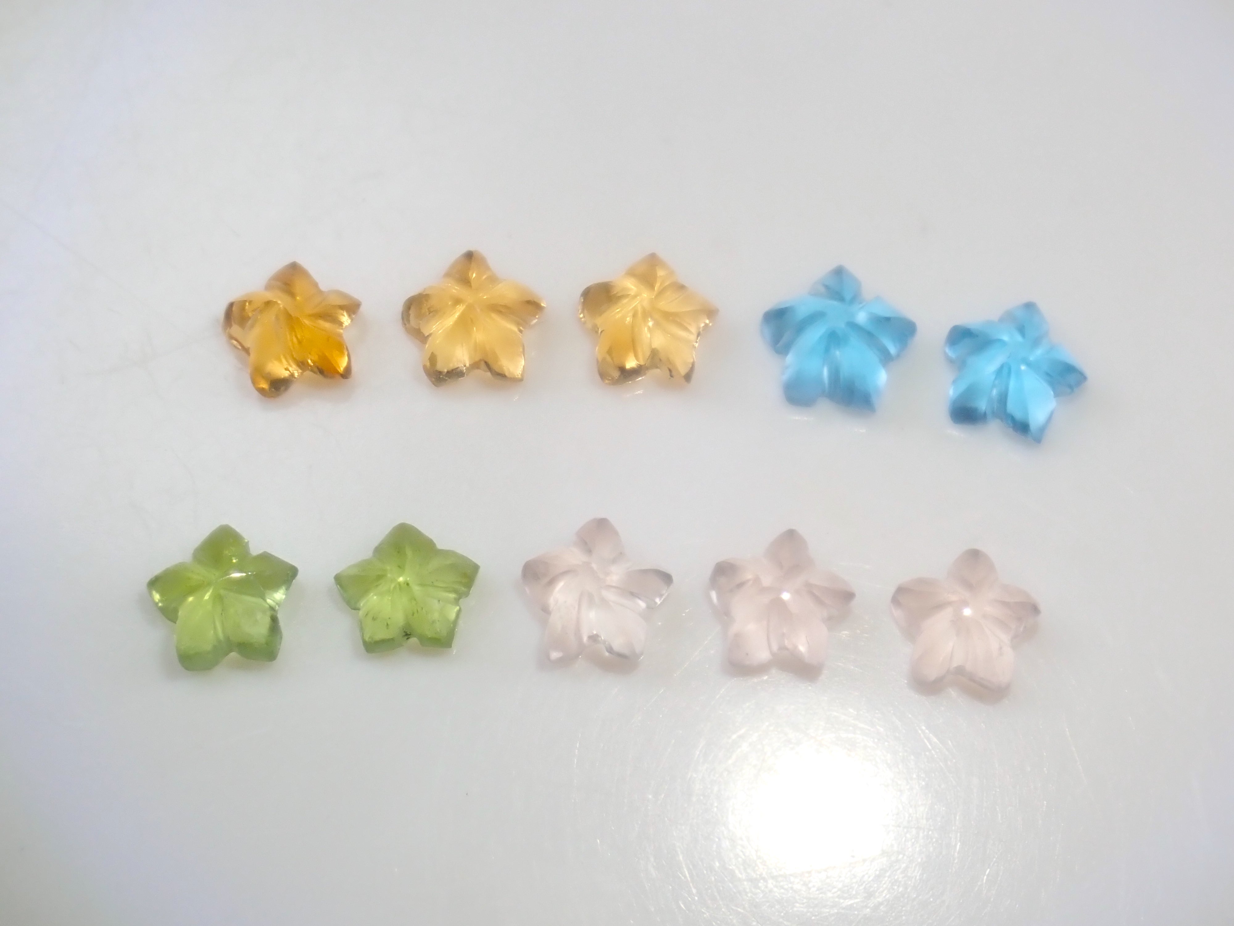 【3/28 22時販売】《限定10石》プルメリアカットのカービング（ペリドット、ブルートパーズ、シトリン、ローズクォーツ） 1石《複数購入割引有》