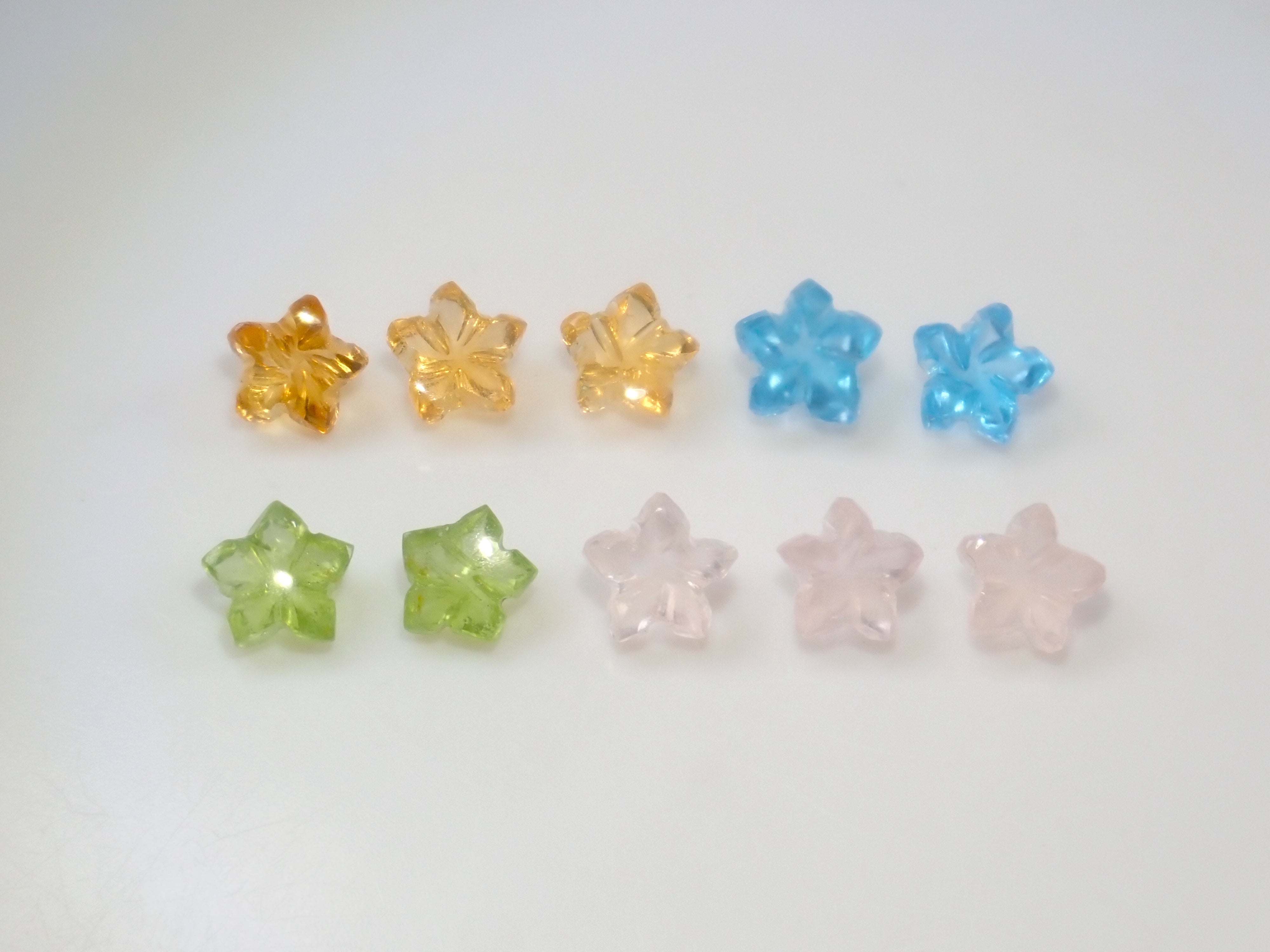 【3/28 22時販売】《限定10石》プルメリアカットのカービング（ペリドット、ブルートパーズ、シトリン、ローズクォーツ） 1石《複数購入割引有》