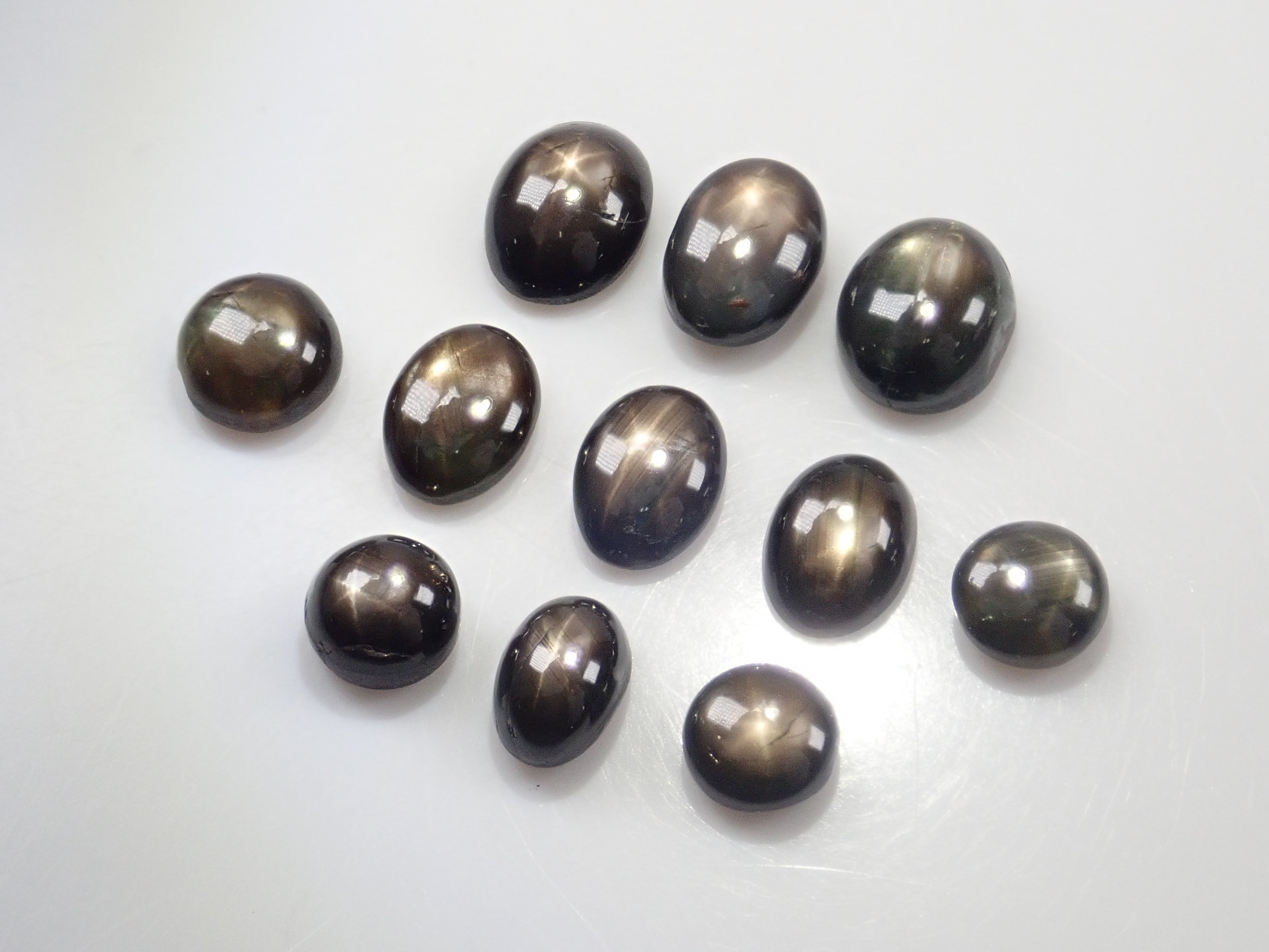 Limited to 13 stones: 1 black star sapphire loose stone (including 2 8-line star sapphires) Multiple purchase discounts available