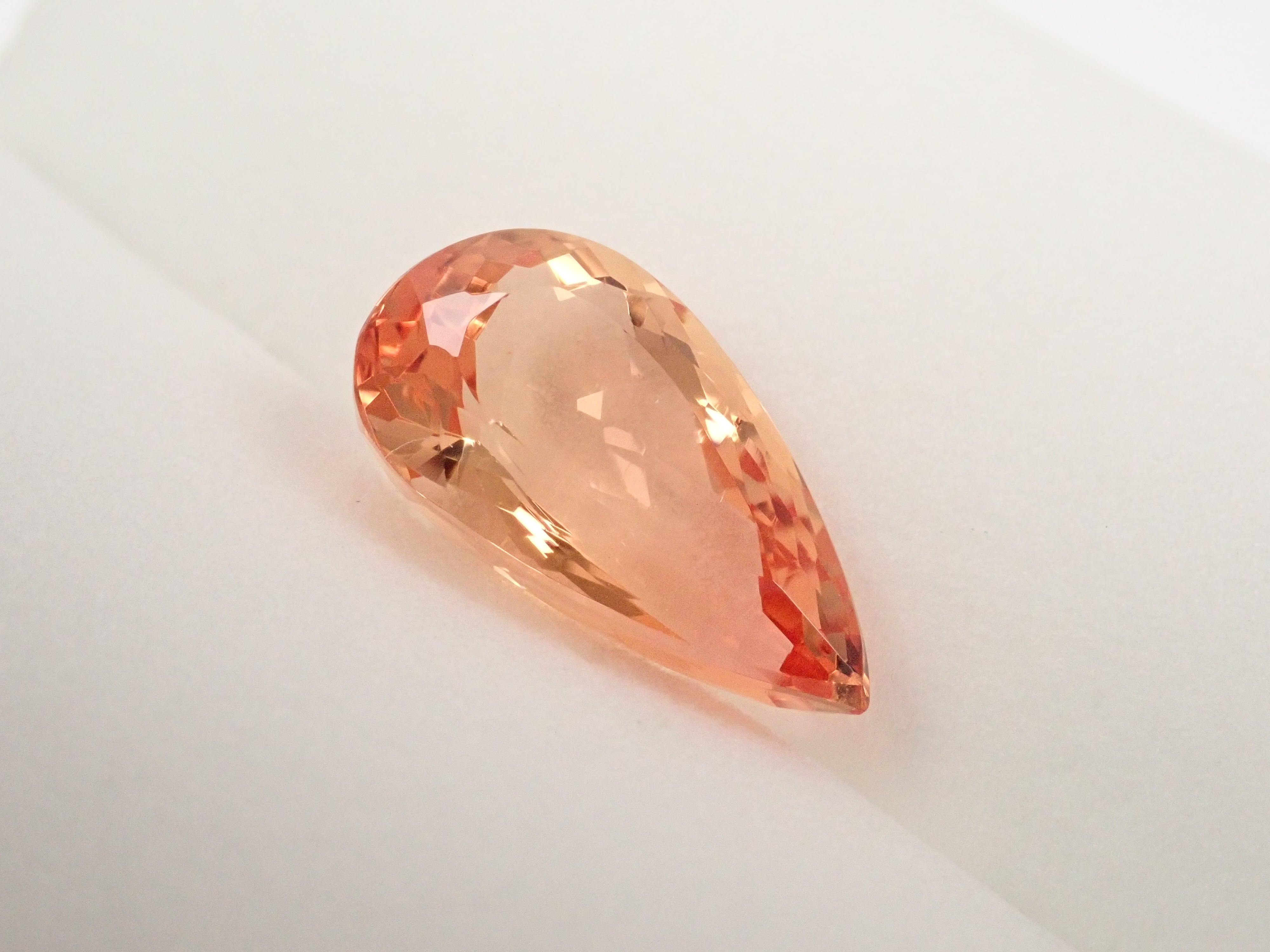 【12562595掲載】ブラジル産インペリアルトパーズ 3.999ctルース