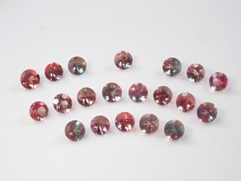 Limited to 20 stones: Tibetan bicolor andesine (color change andesine) 1 stone (3mm, round cut) Multiple purchase discounts available
