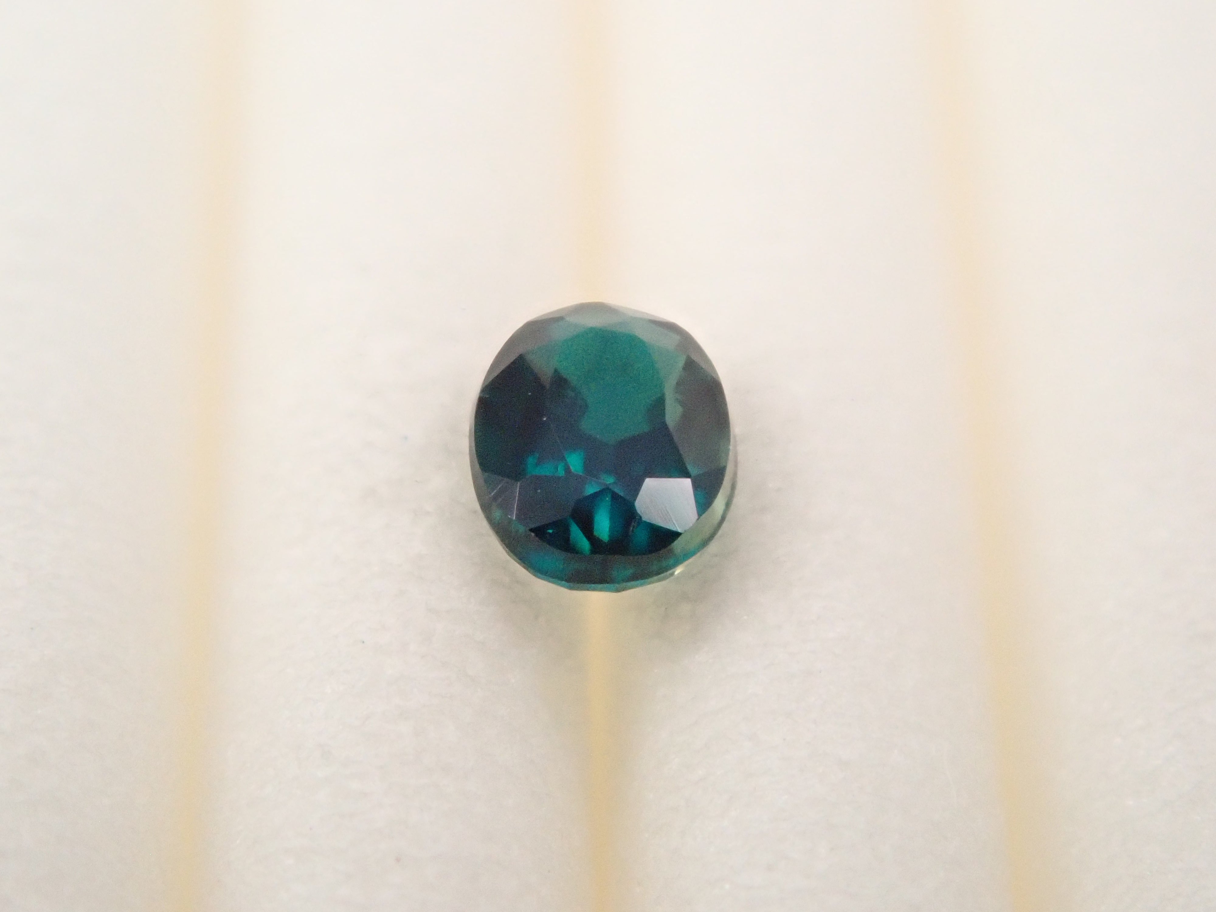 【12562656掲載】マダガスカル産グランディディエライト 0.132ctルース