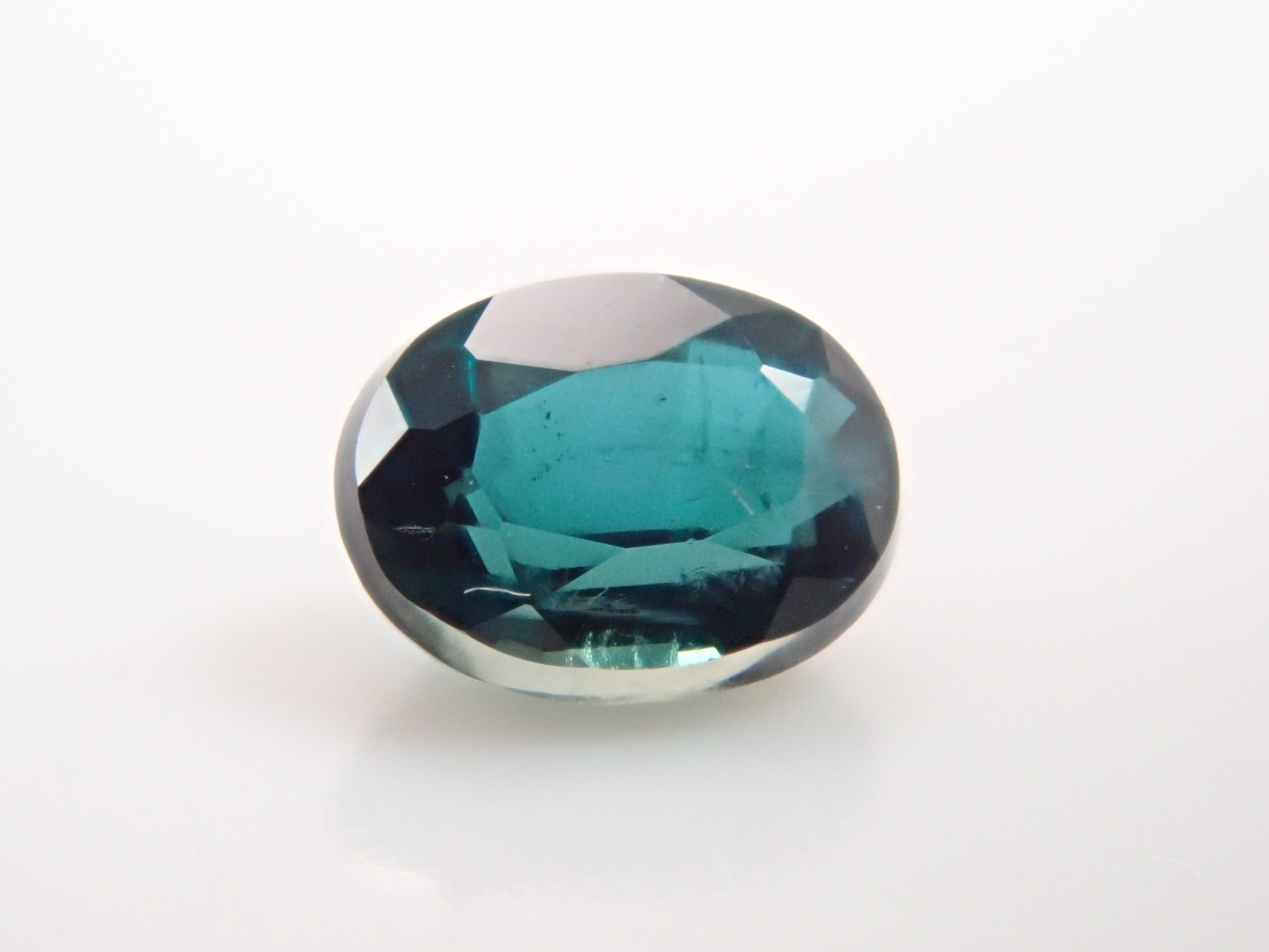 【12562656掲載】マダガスカル産グランディディエライト 0.132ctルース