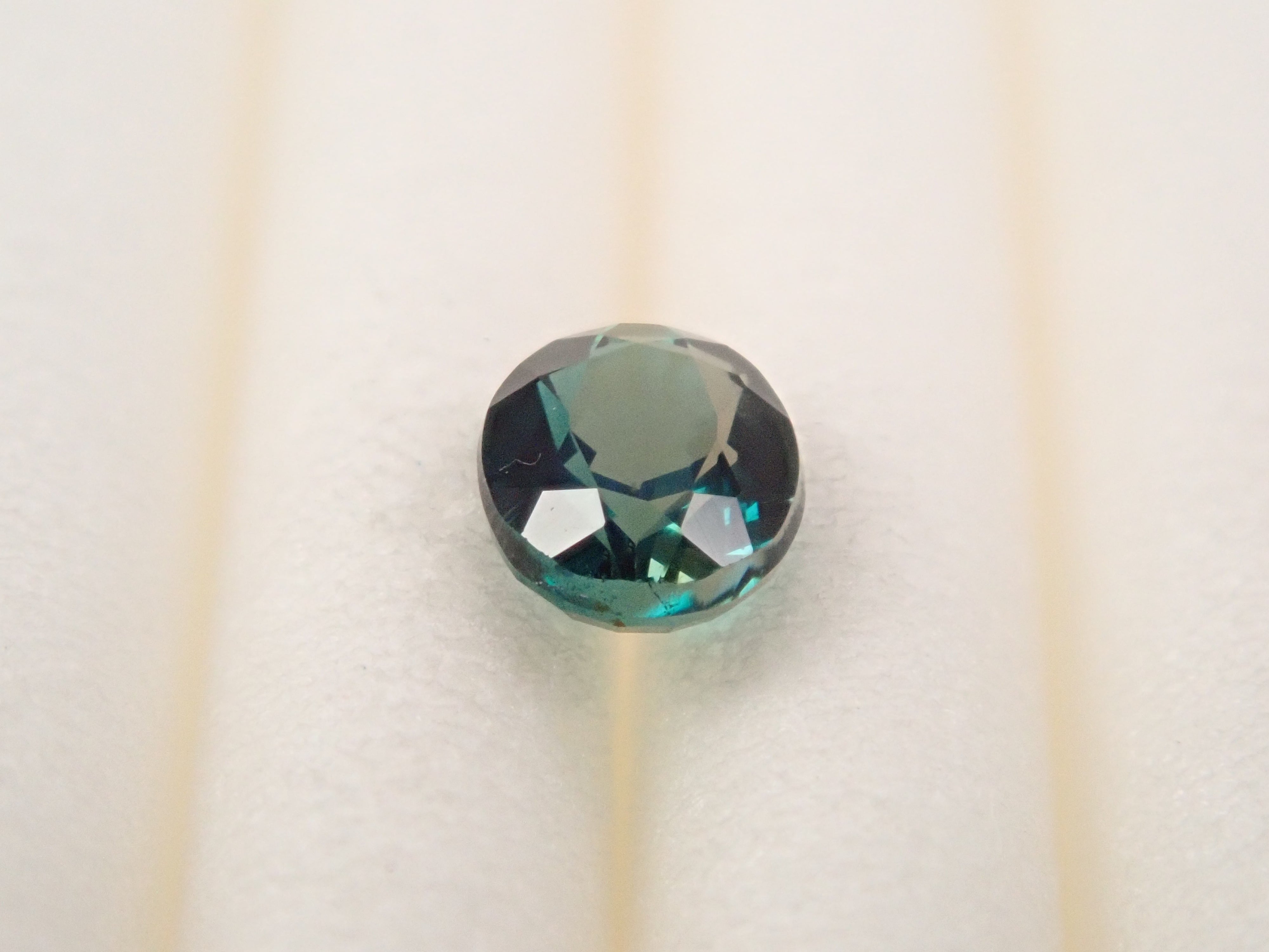 【12562657掲載】マダガスカル産グランディディエライト 0.163ctルース