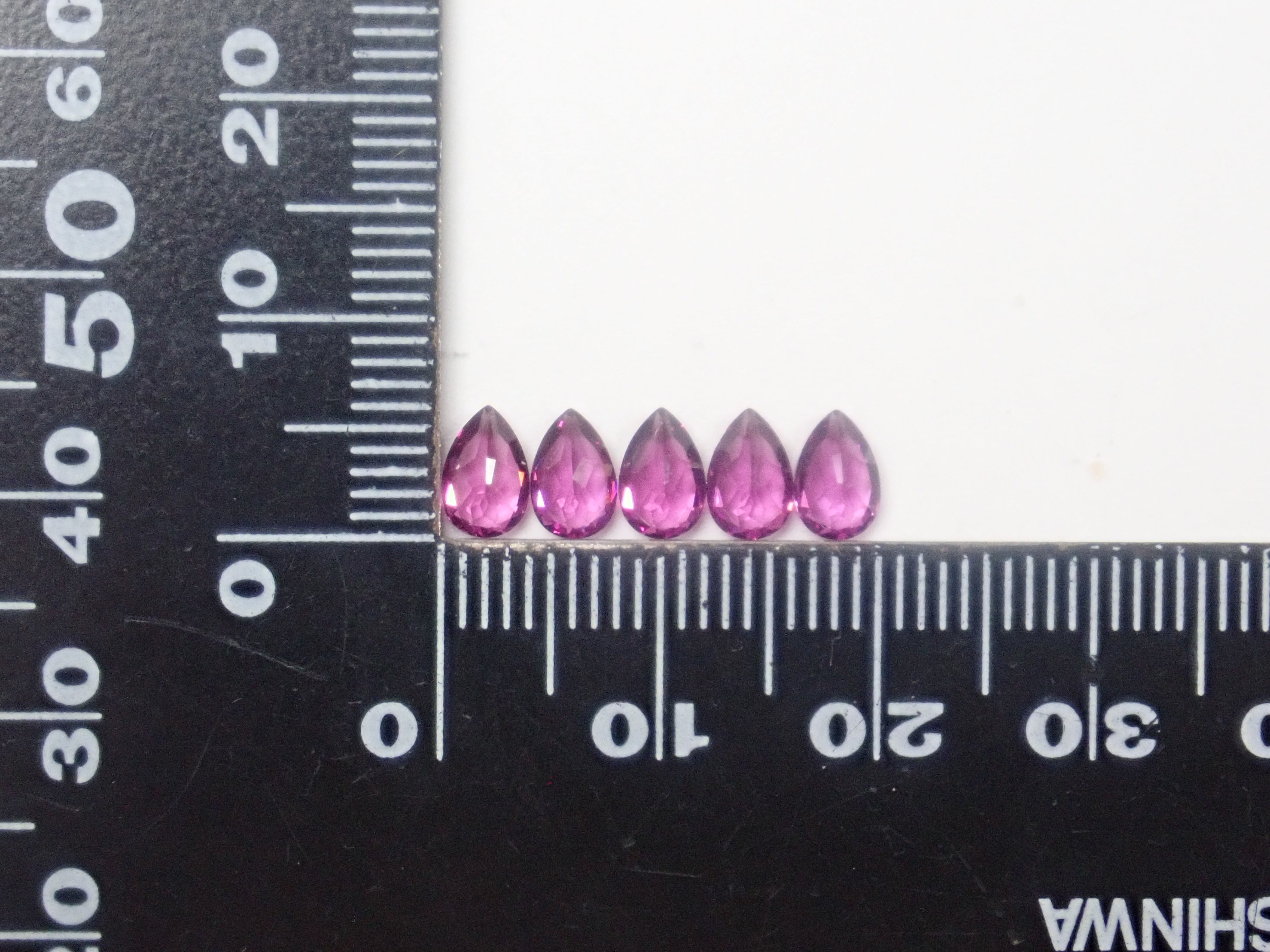 モザンビーク産グレープガーネット1石ルース（6×4mm,ペアシェイプ