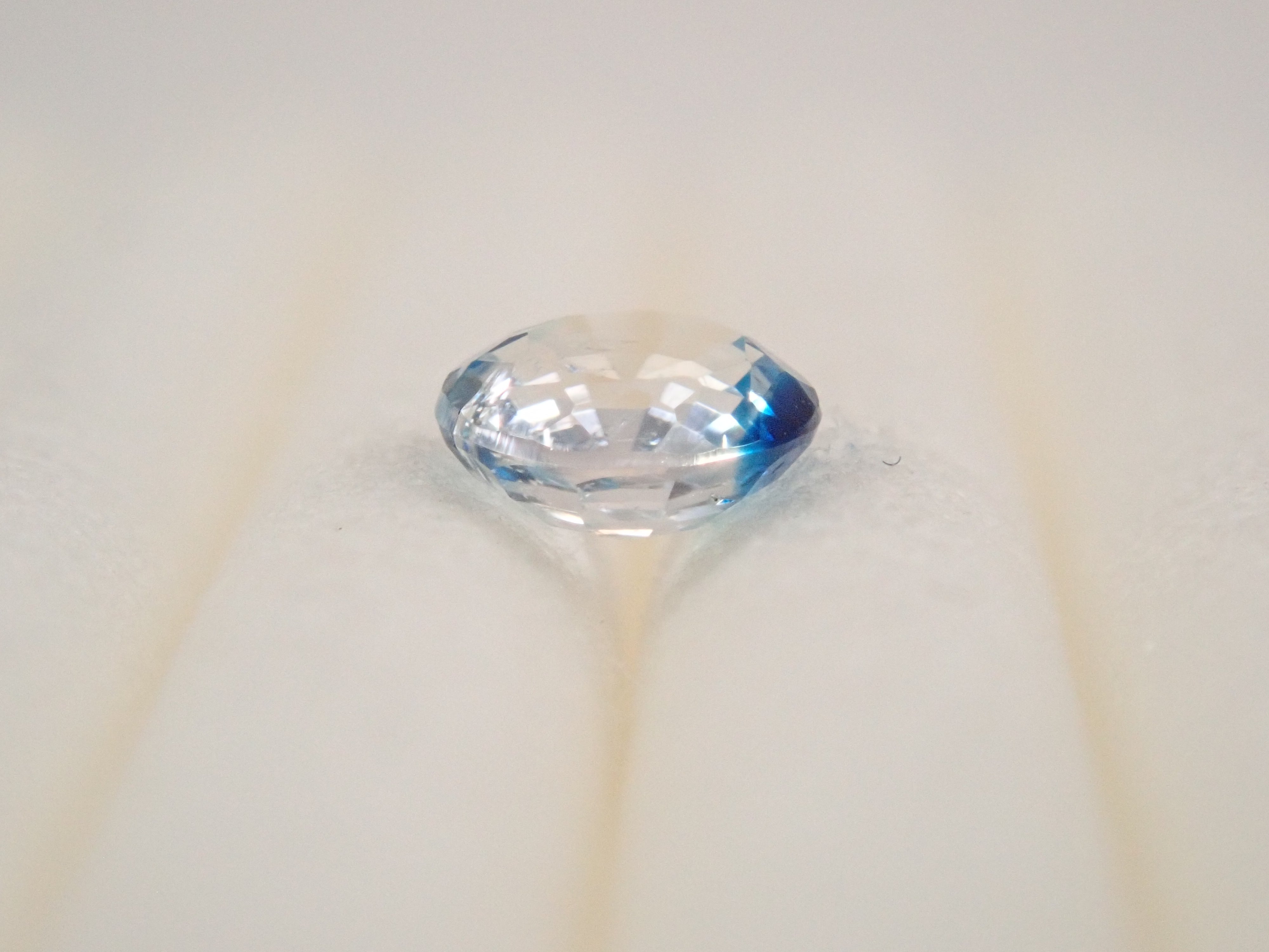 【12562665掲載】ジンバブエ産バイカラーユークレース 0.176ctルース