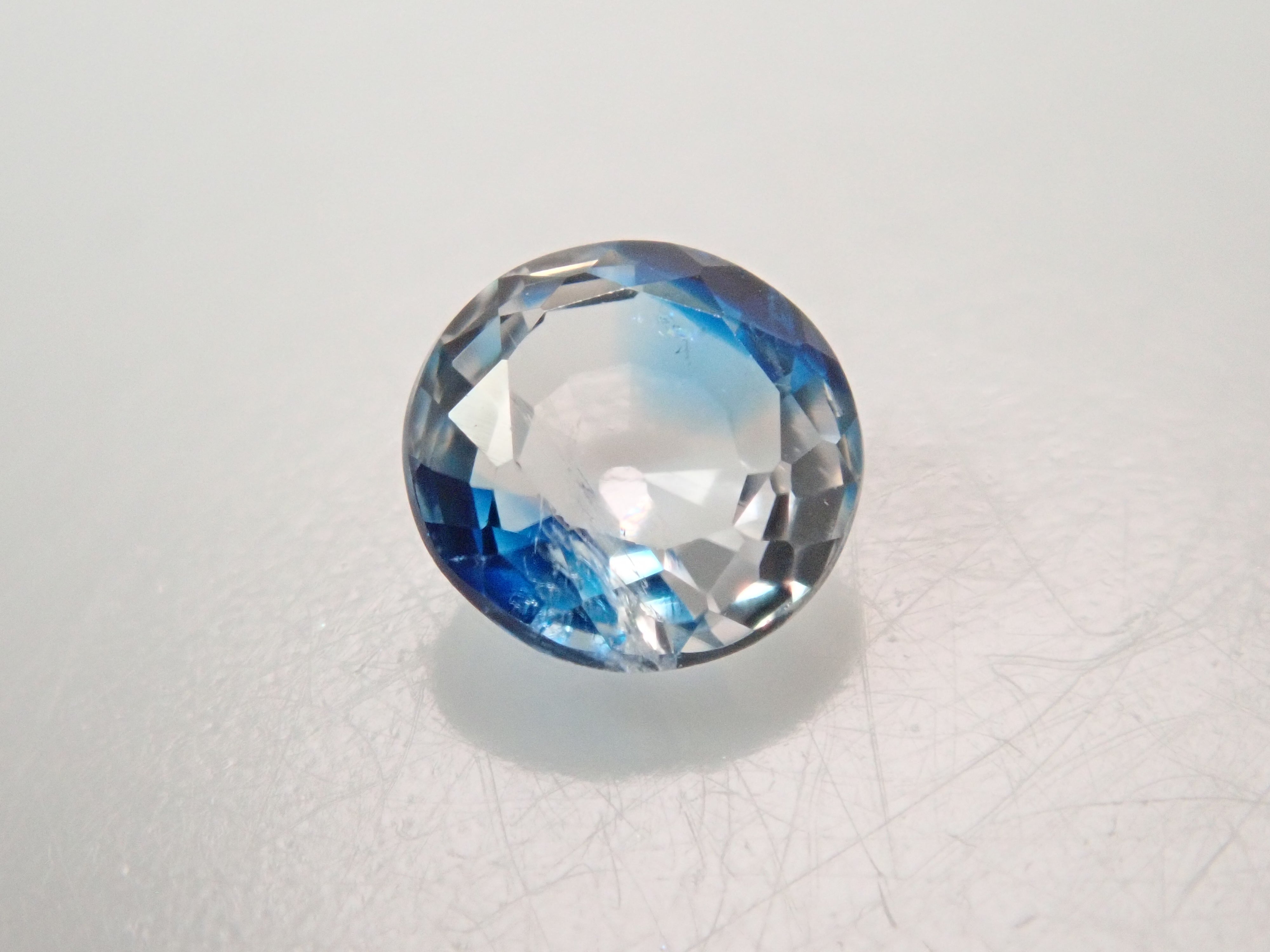 【12562665掲載】ジンバブエ産バイカラーユークレース 0.176ctルース