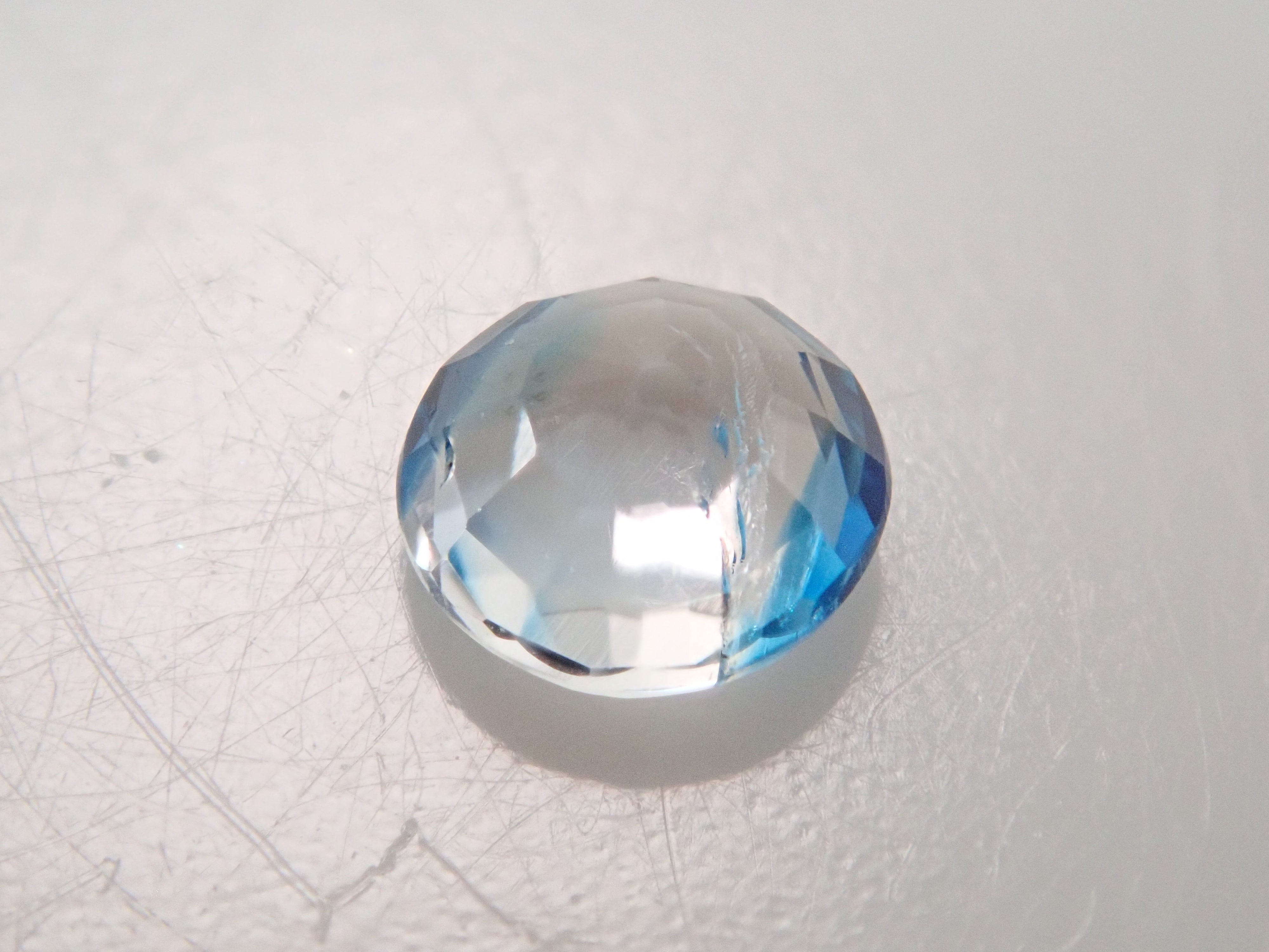 【12562665掲載】ジンバブエ産バイカラーユークレース 0.176ctルース