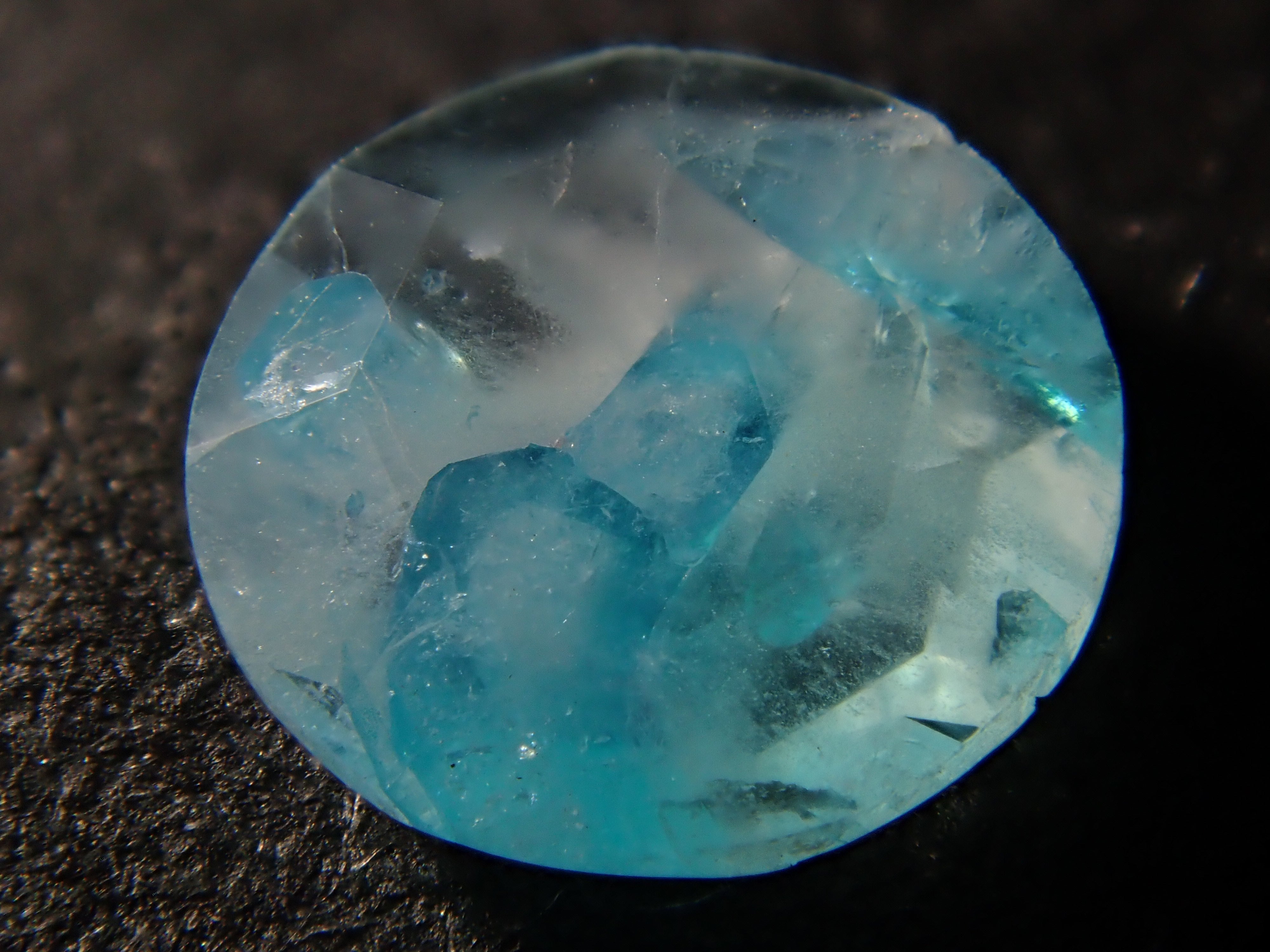 【12555695掲載】ブラジル産パライバトルマリンインクォーツ 0.313ctルース