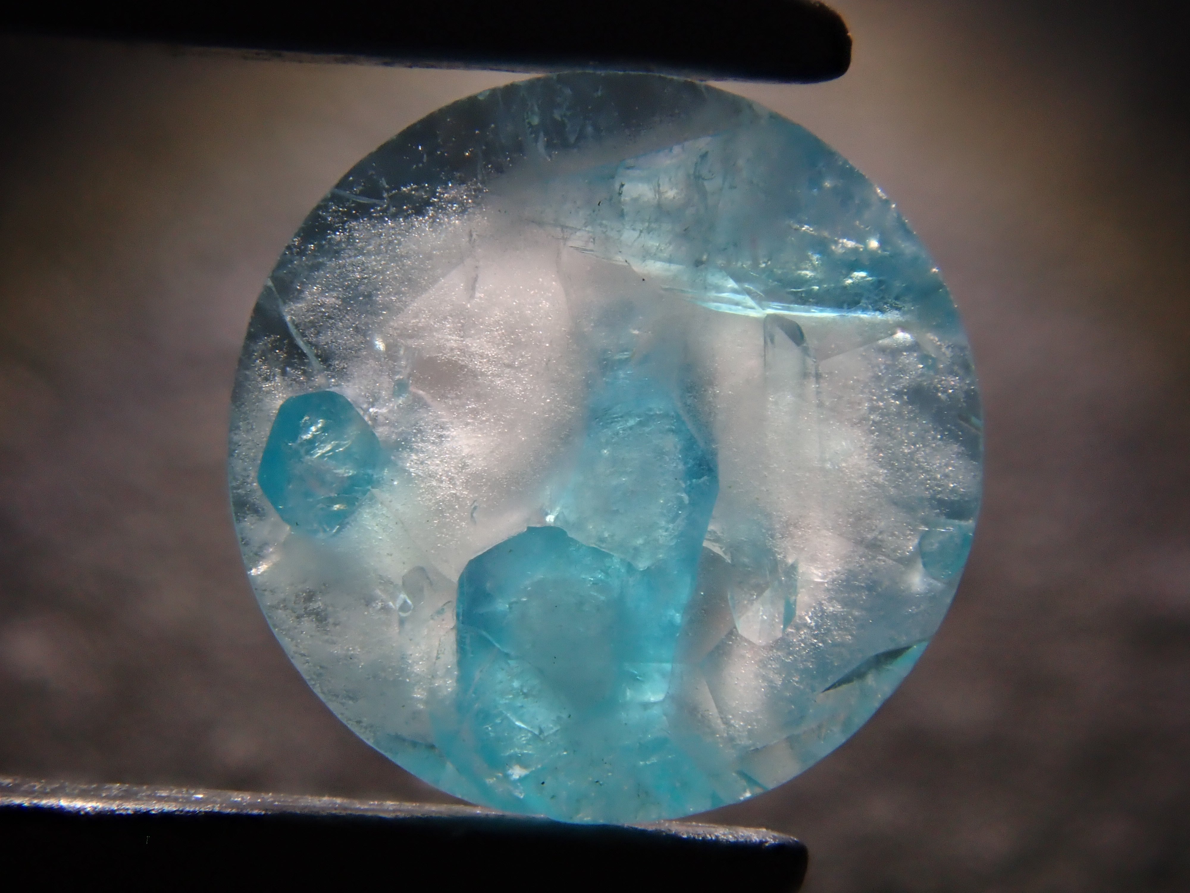 【12555695掲載】ブラジル産パライバトルマリンインクォーツ 0.313ctルース