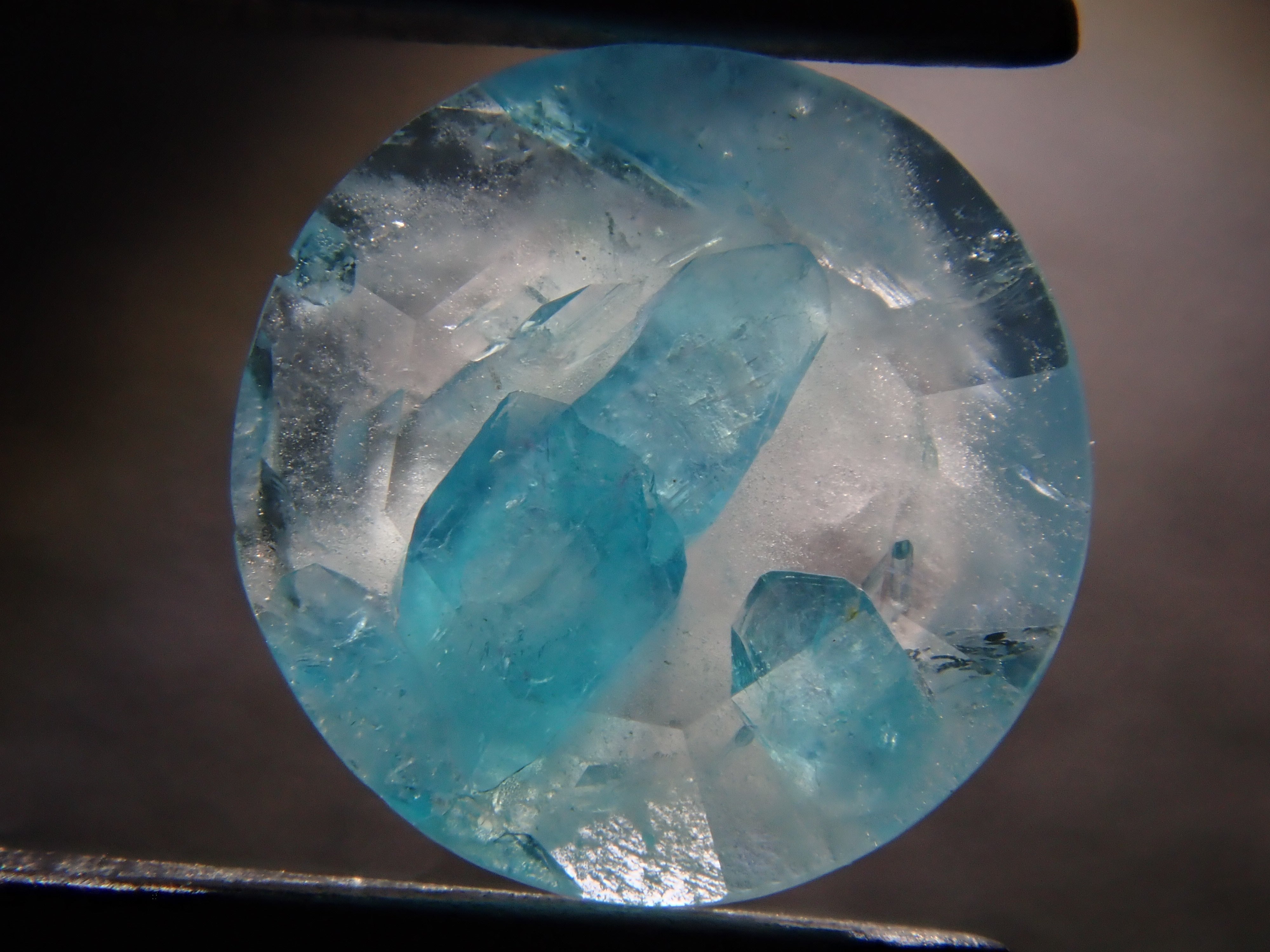 【12555695掲載】ブラジル産パライバトルマリンインクォーツ 0.313ctルース