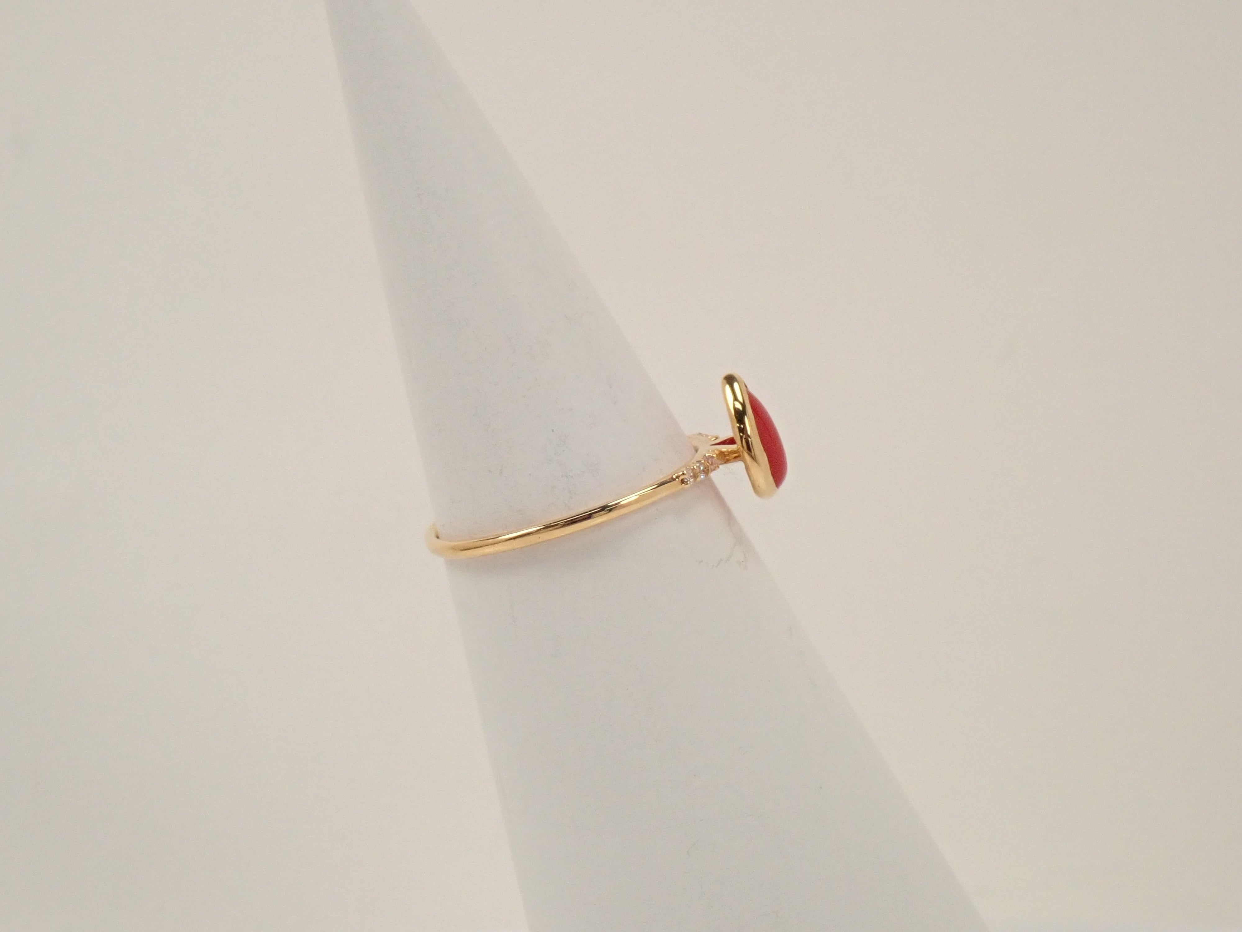 【22602551掲載】K18 血赤珊瑚 0.56ct リング