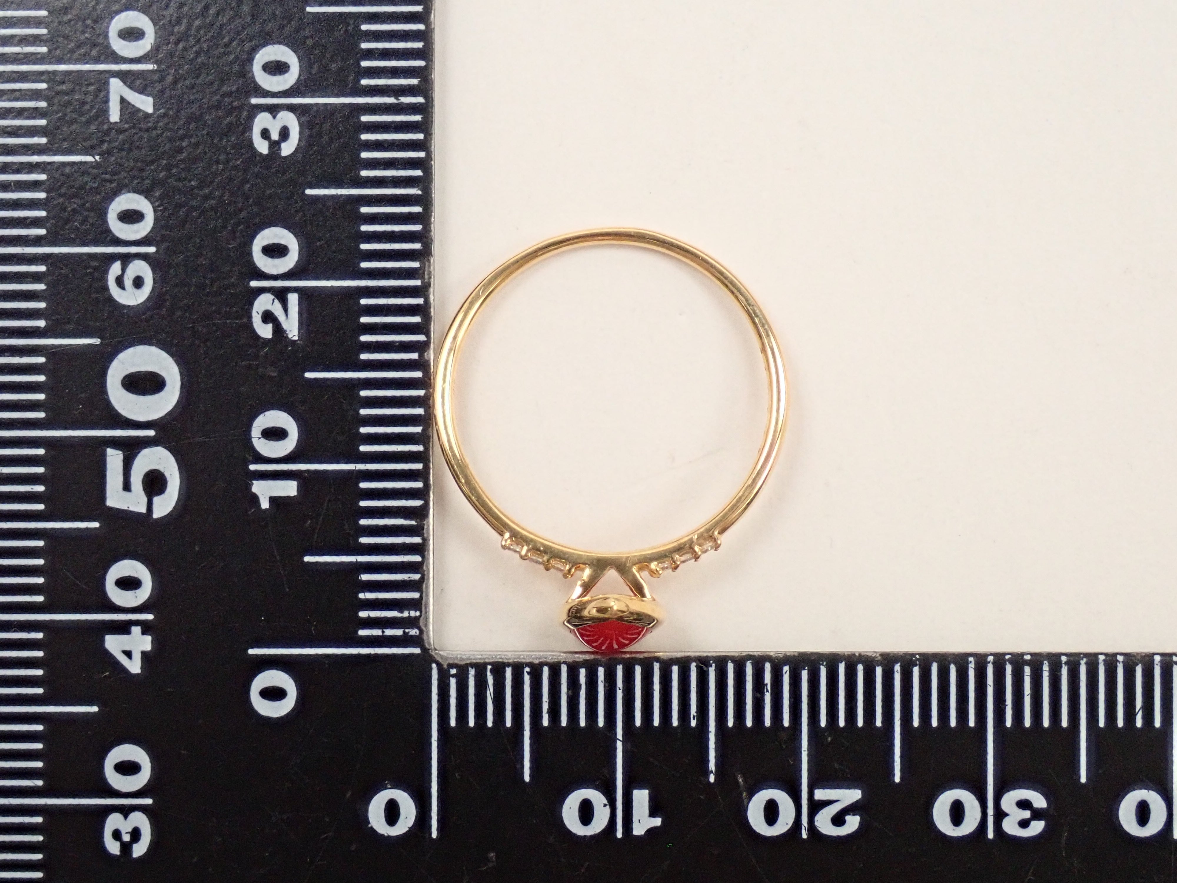 【22602551掲載】K18 血赤珊瑚 0.56ct リング