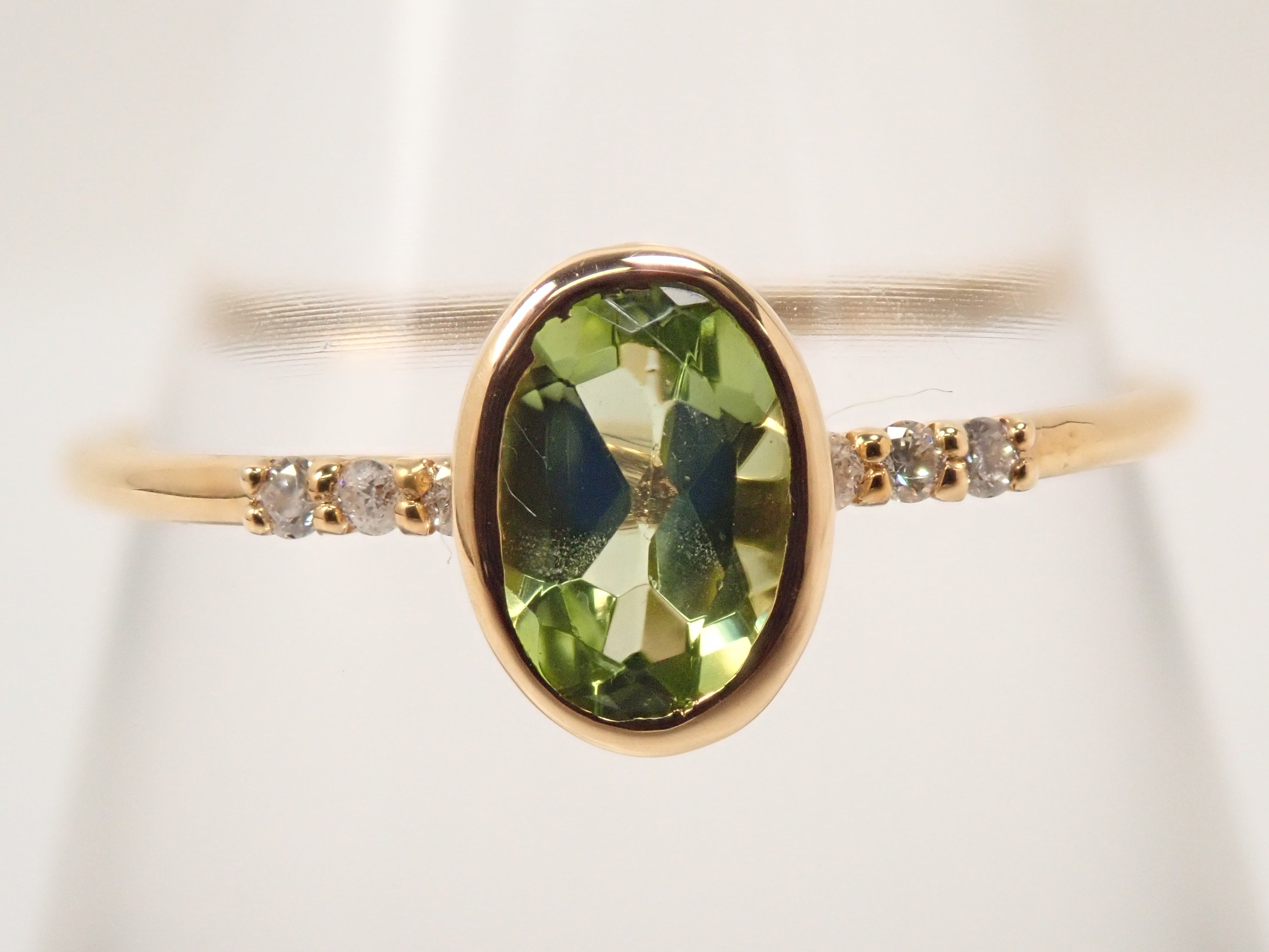 【22602553掲載】K18 ペリドット リング