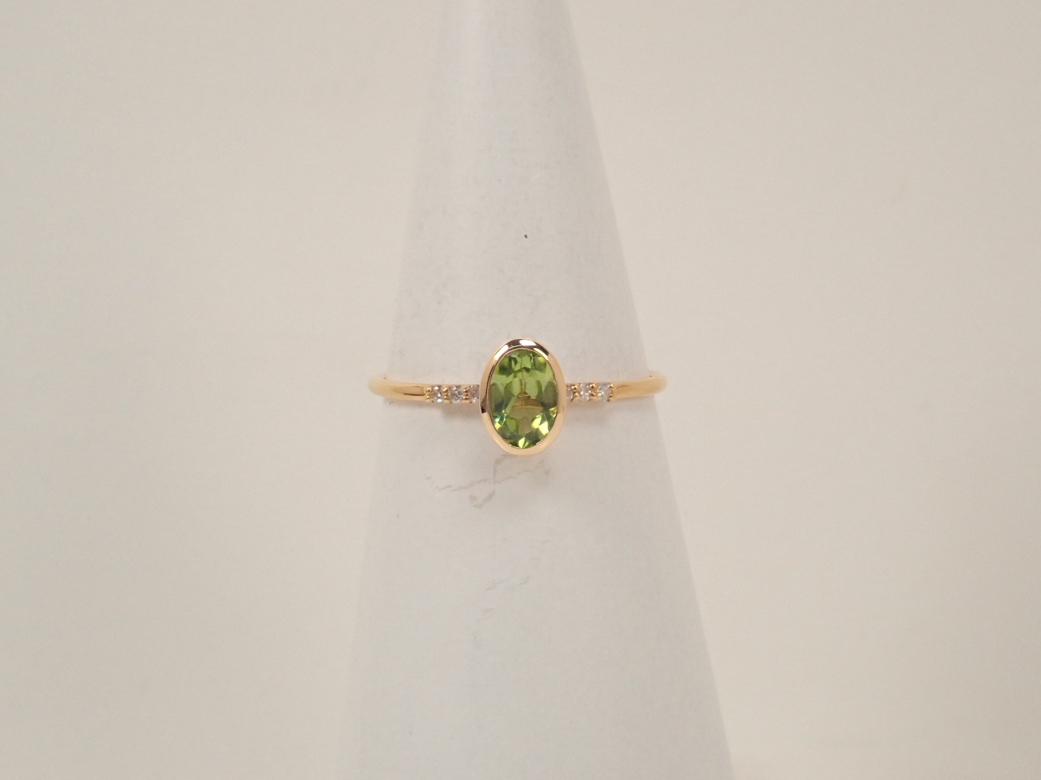 【22602554掲載】K18 ペリドット リング