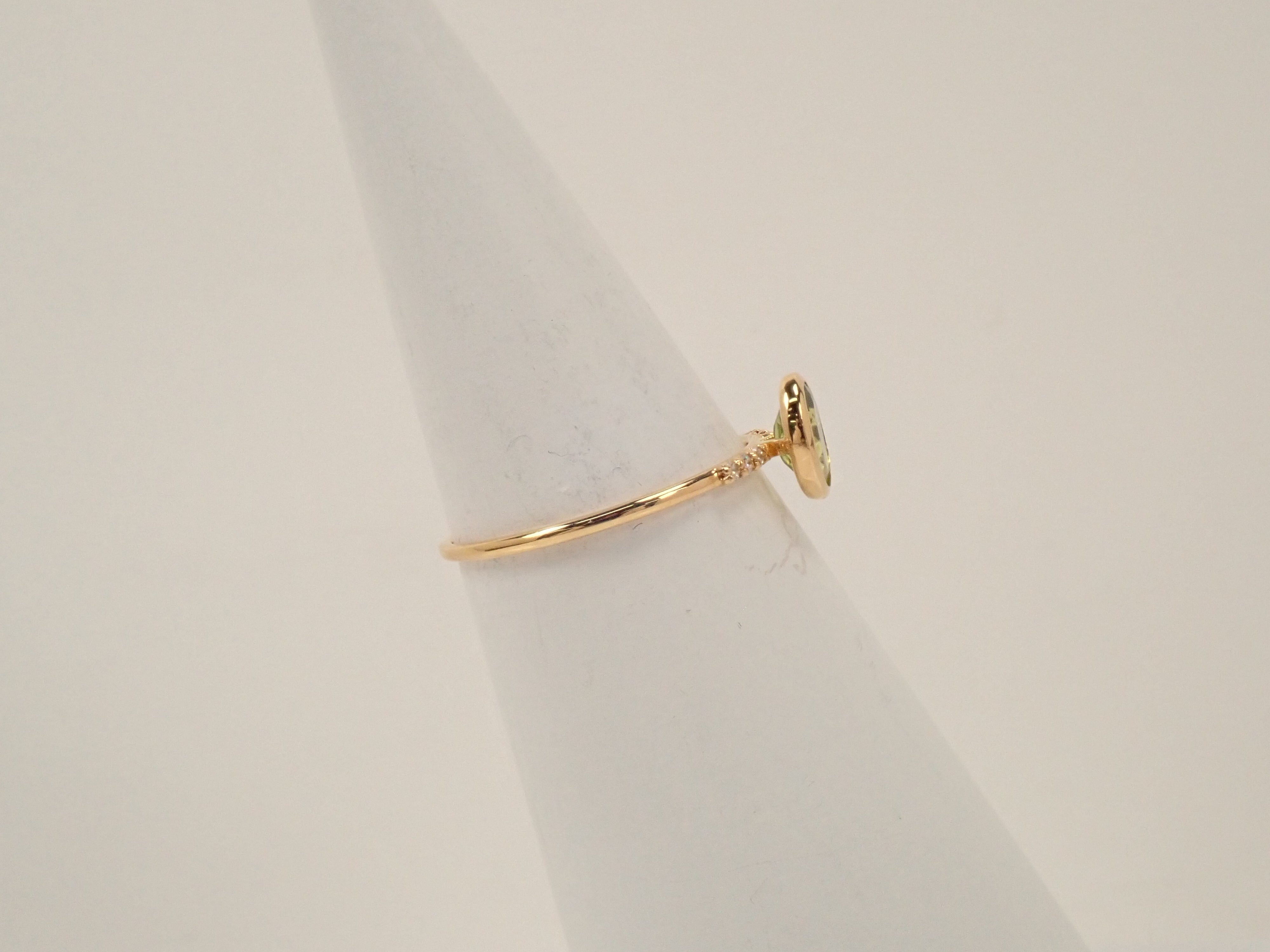 【22602554掲載】K18 ペリドット リング