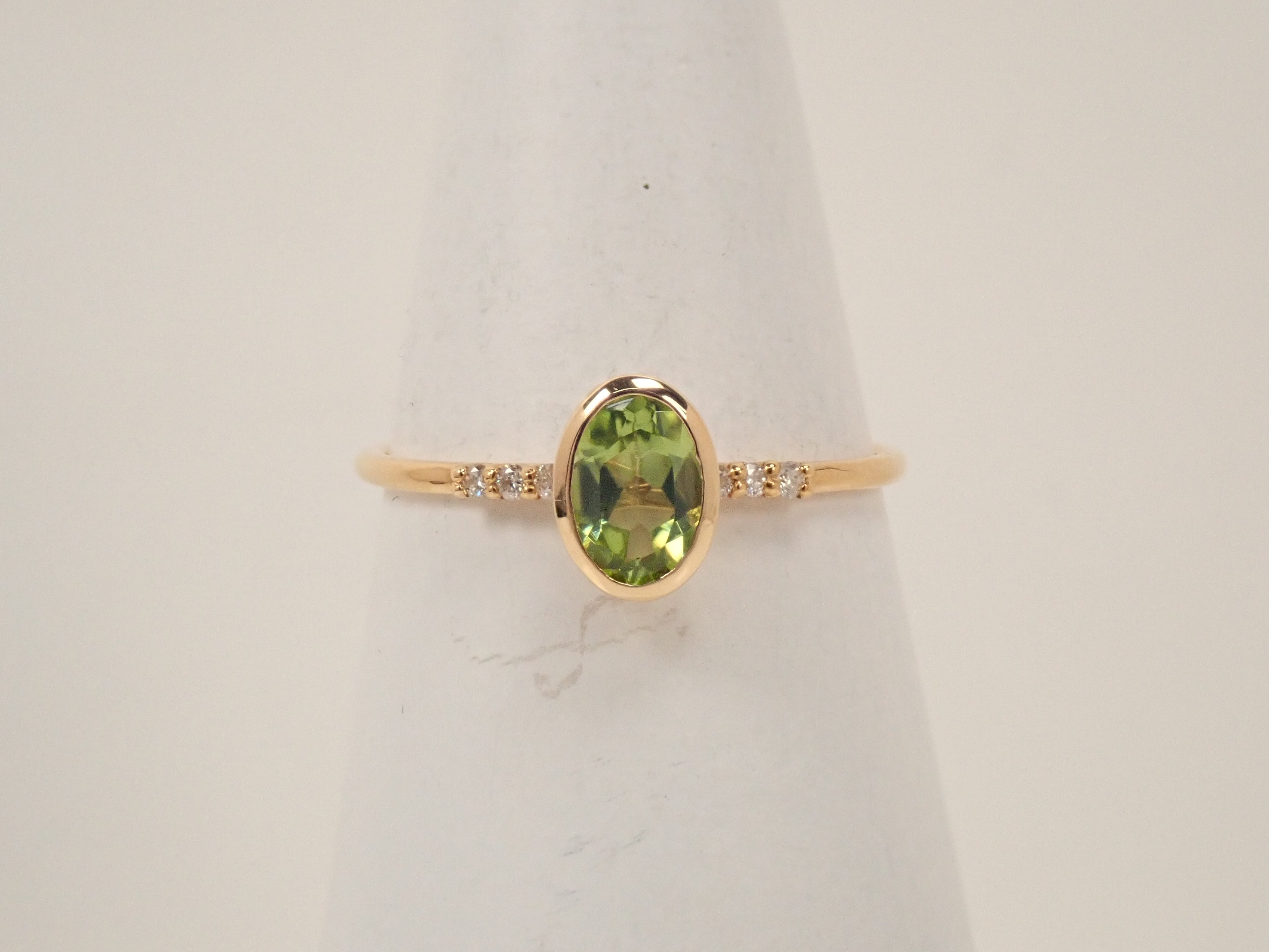 【22602554掲載】K18 ペリドット リング