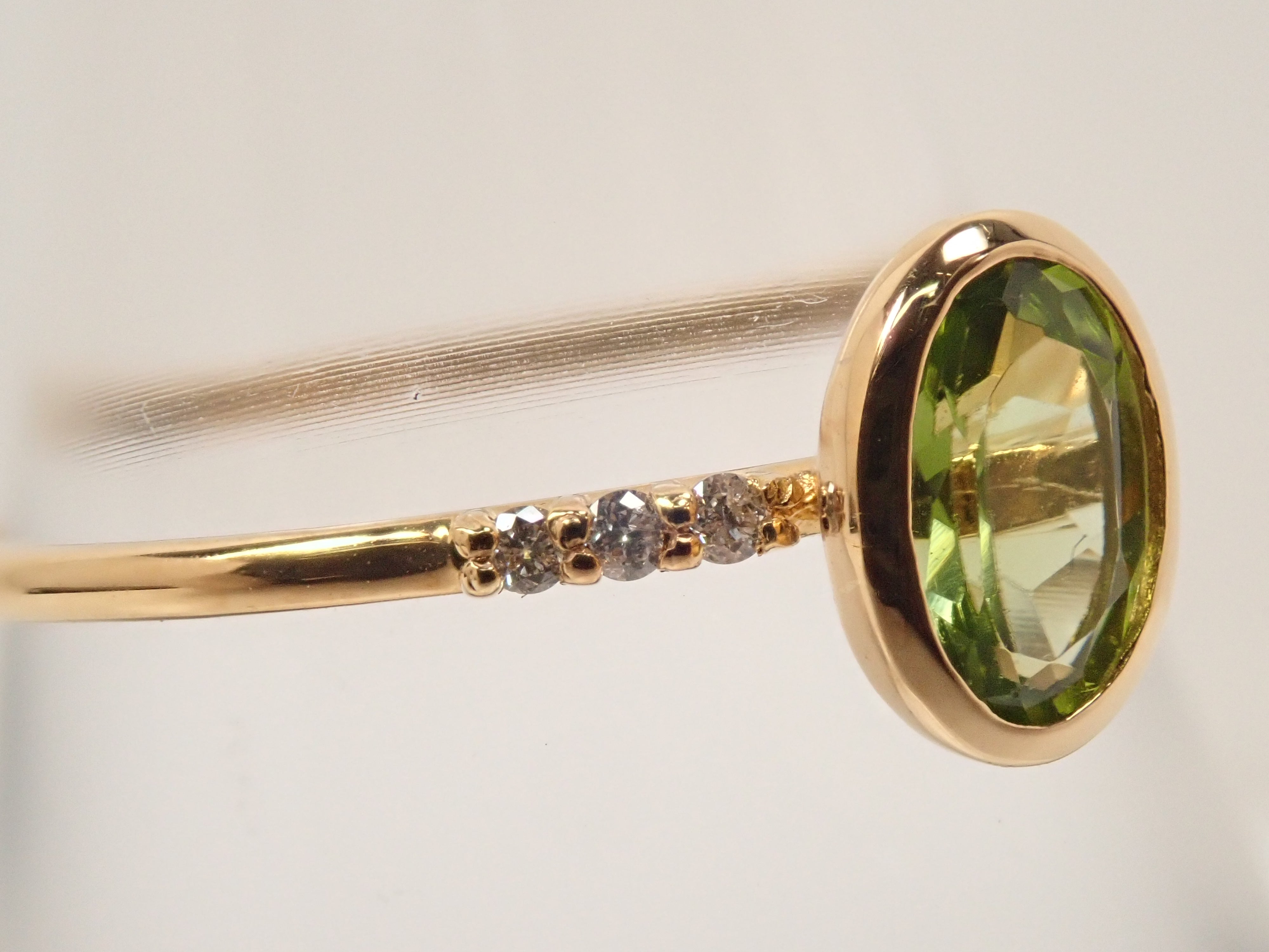 【22602554掲載】K18 ペリドット リング