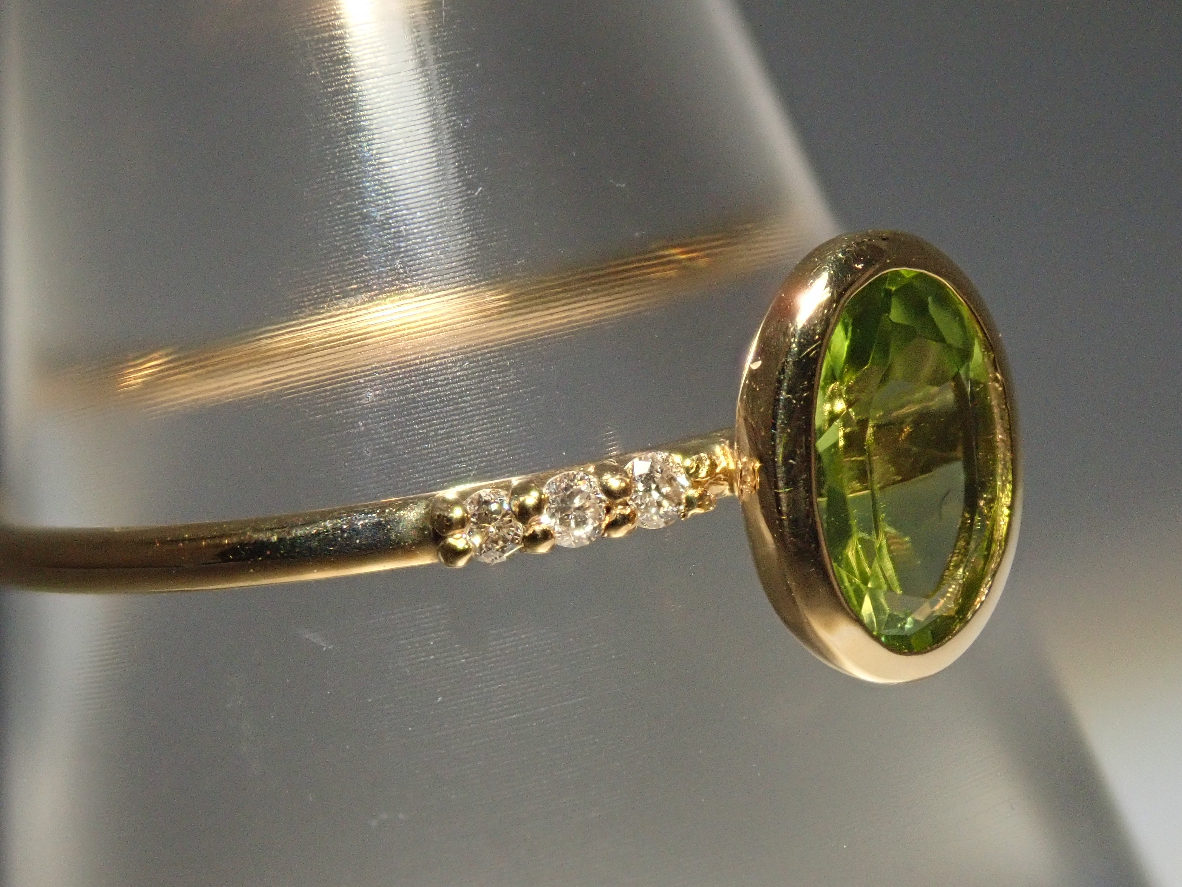 【22602554掲載】K18 ペリドット リング