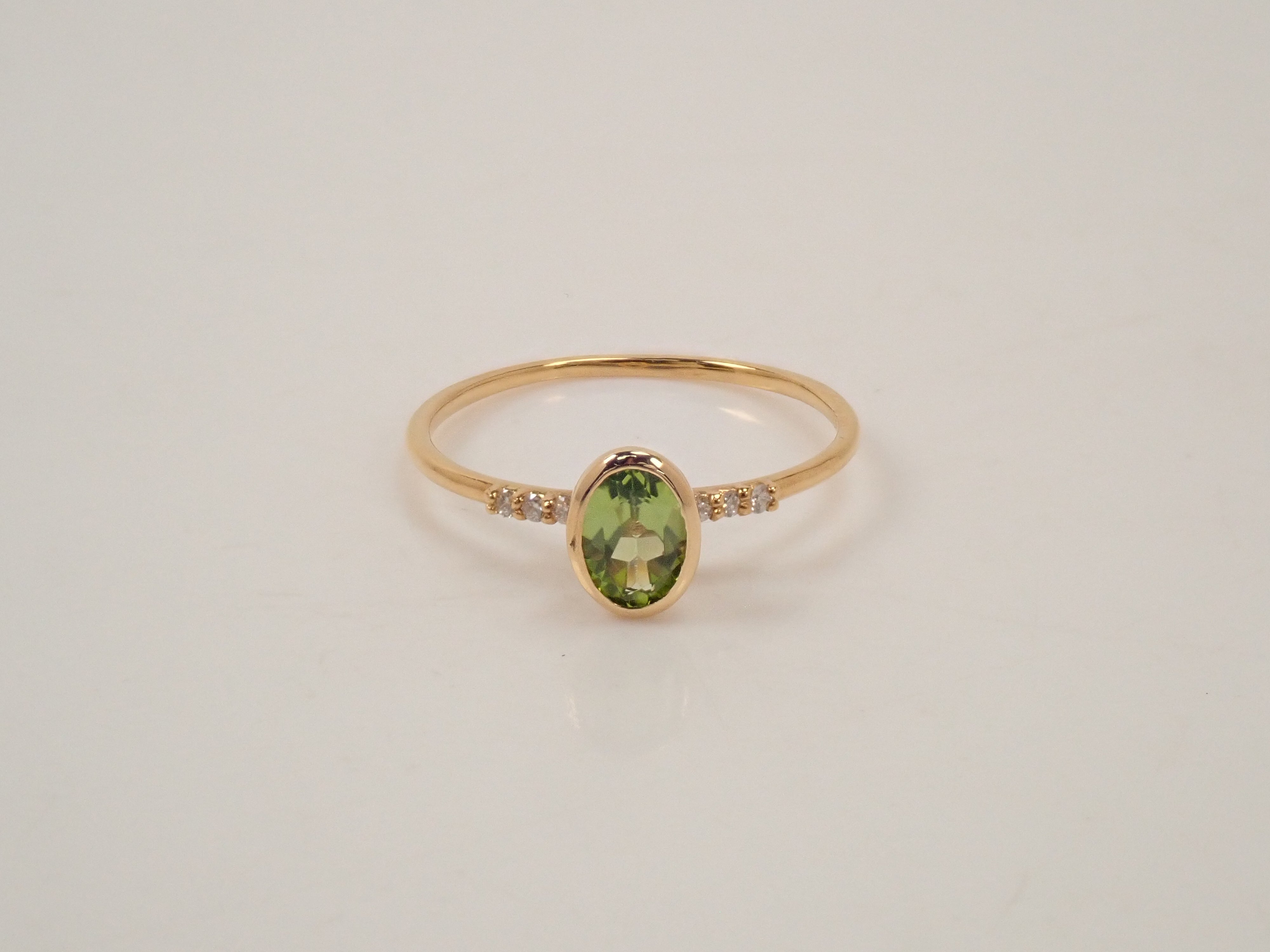 【22602554掲載】K18 ペリドット リング