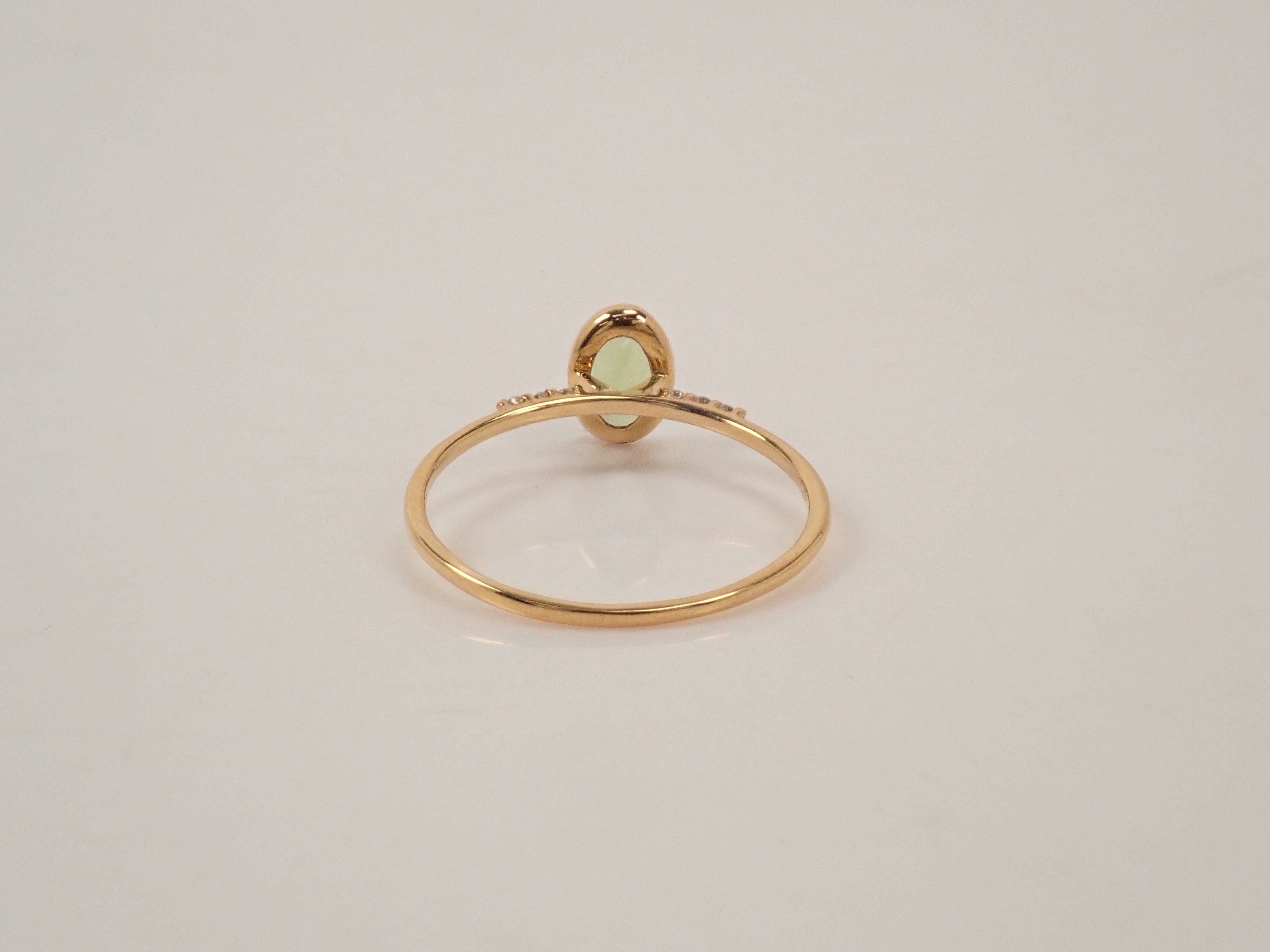 【22602554掲載】K18 ペリドット リング