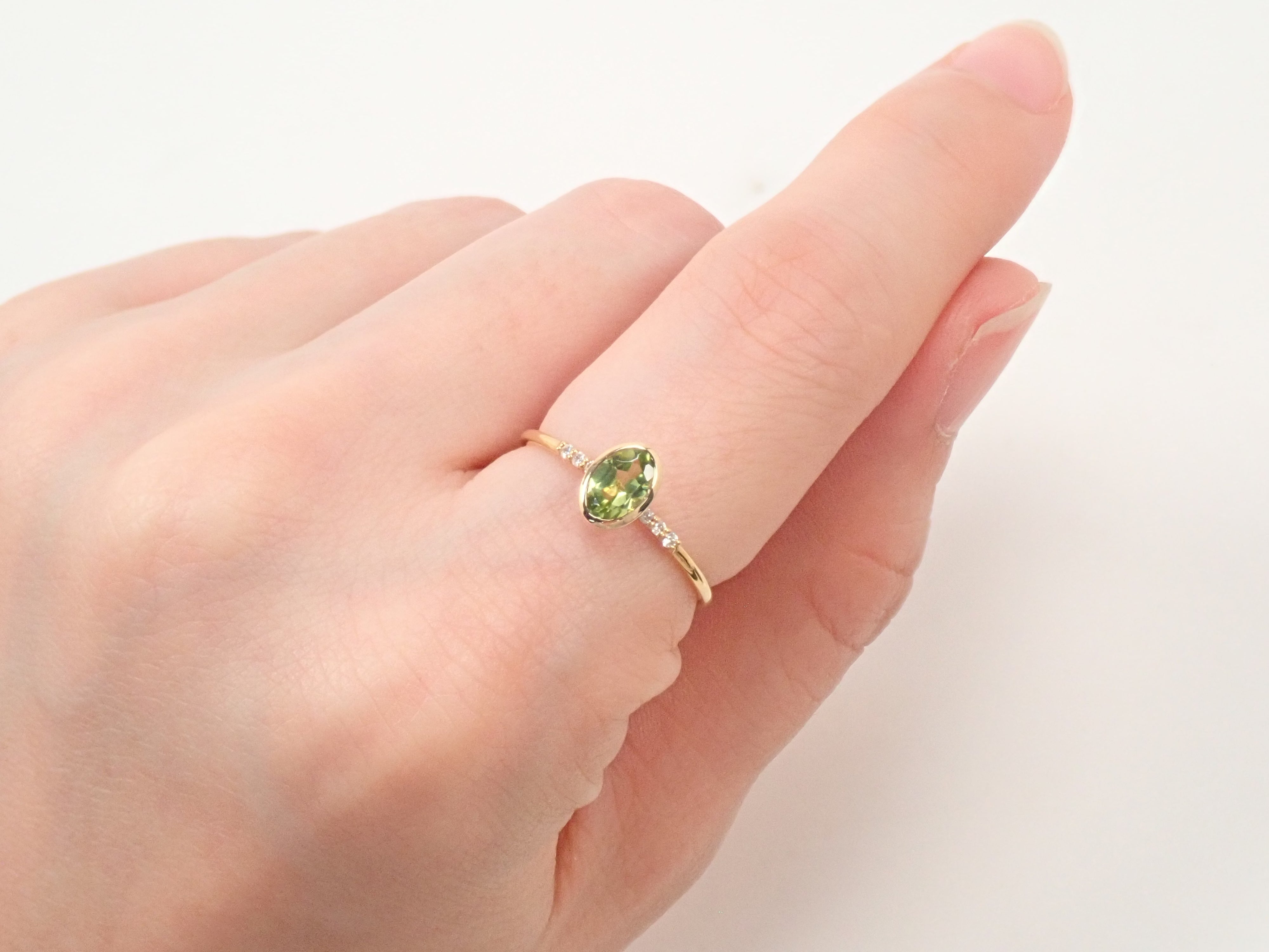 【22602554掲載】K18 ペリドット リング