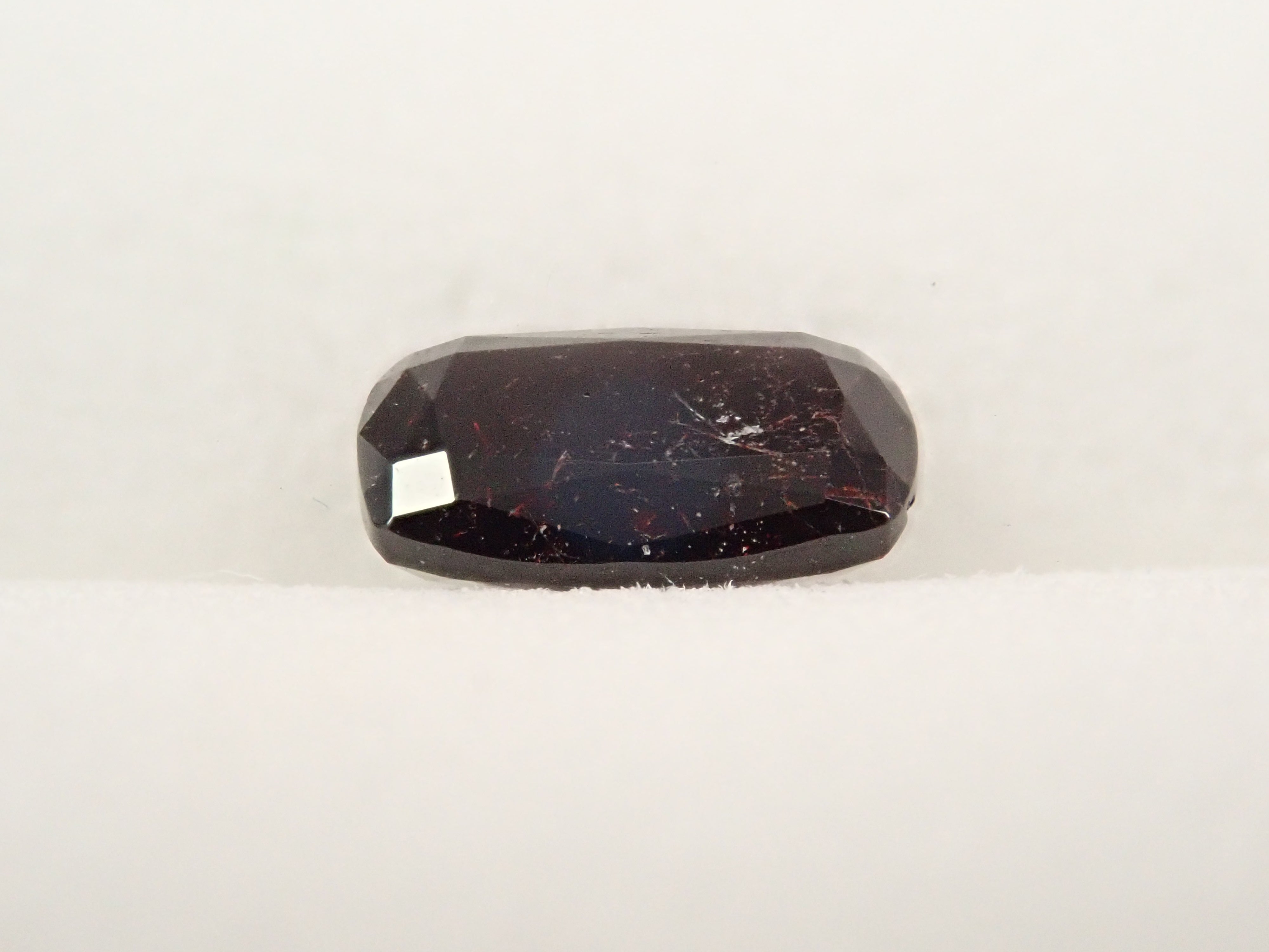 【12562748掲載】アメリカ産ネプチュナイト 0.859ctルース