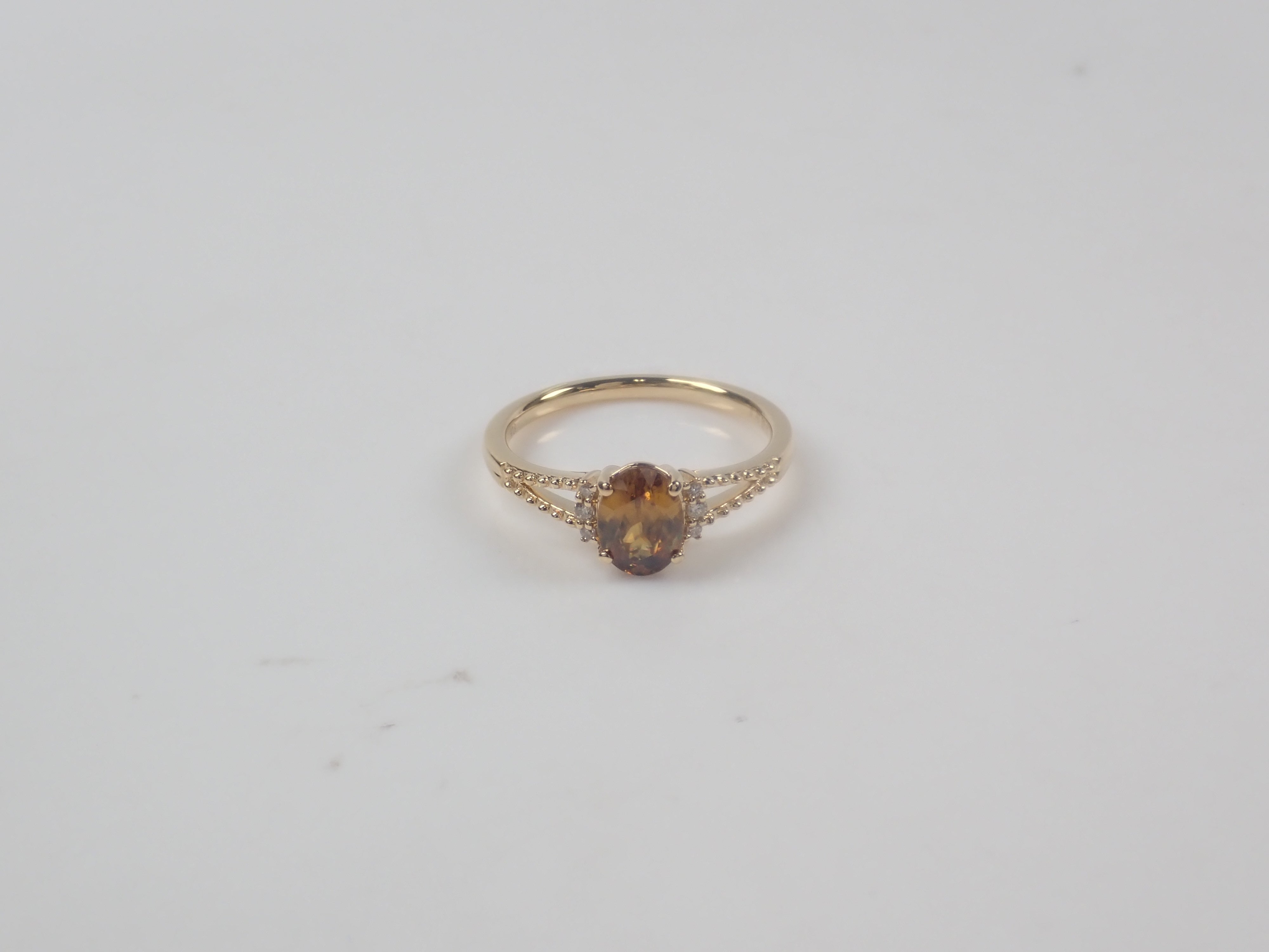 【22602582掲載】【カラフリ】K18 スフェーン 0.7ct リング
