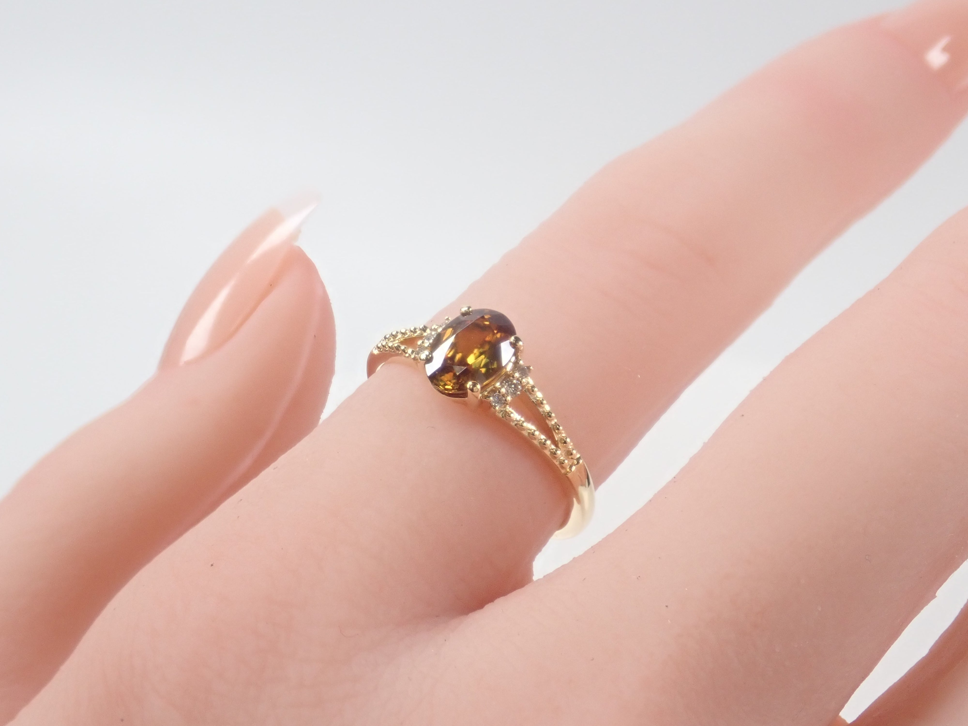 【22602582掲載】【カラフリ】K18 スフェーン 0.7ct リング