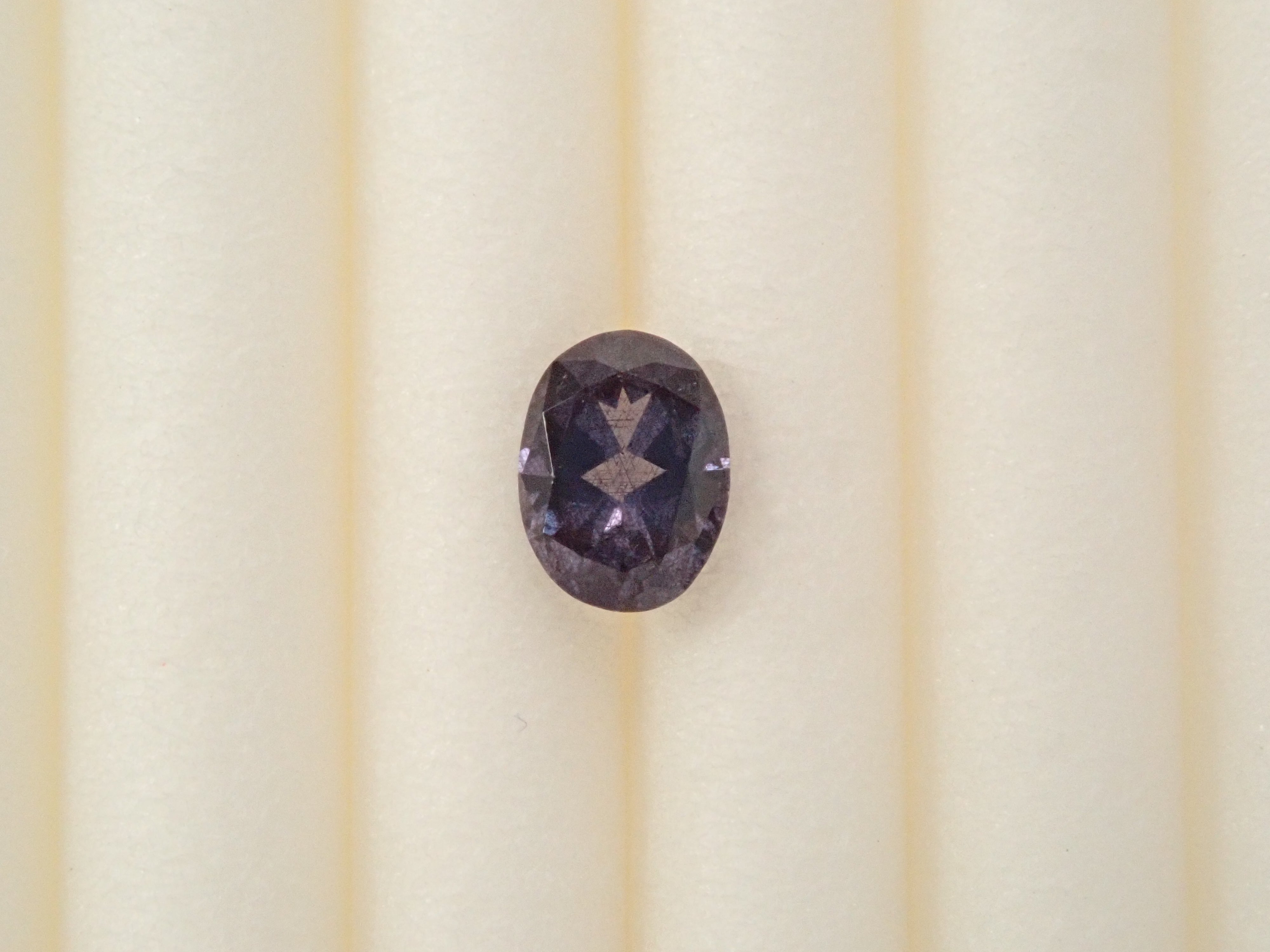 【12562762掲載】マダガスカル産ベキリーブルーガーネット（カラーチェンジガーネット） 0.188ctルース