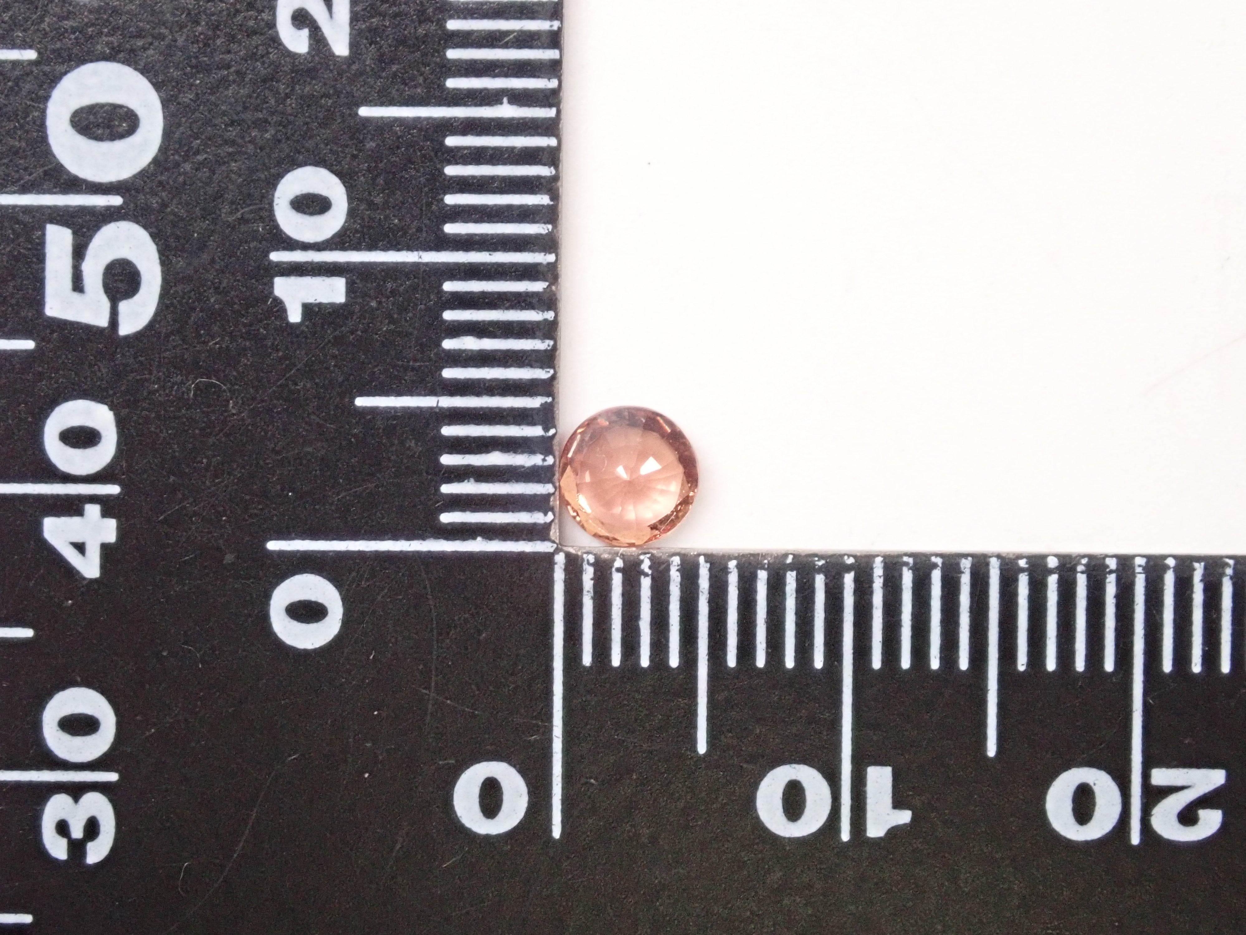 非加熱パパラチアサファイア 4.8mm/0.52ctルース GIA