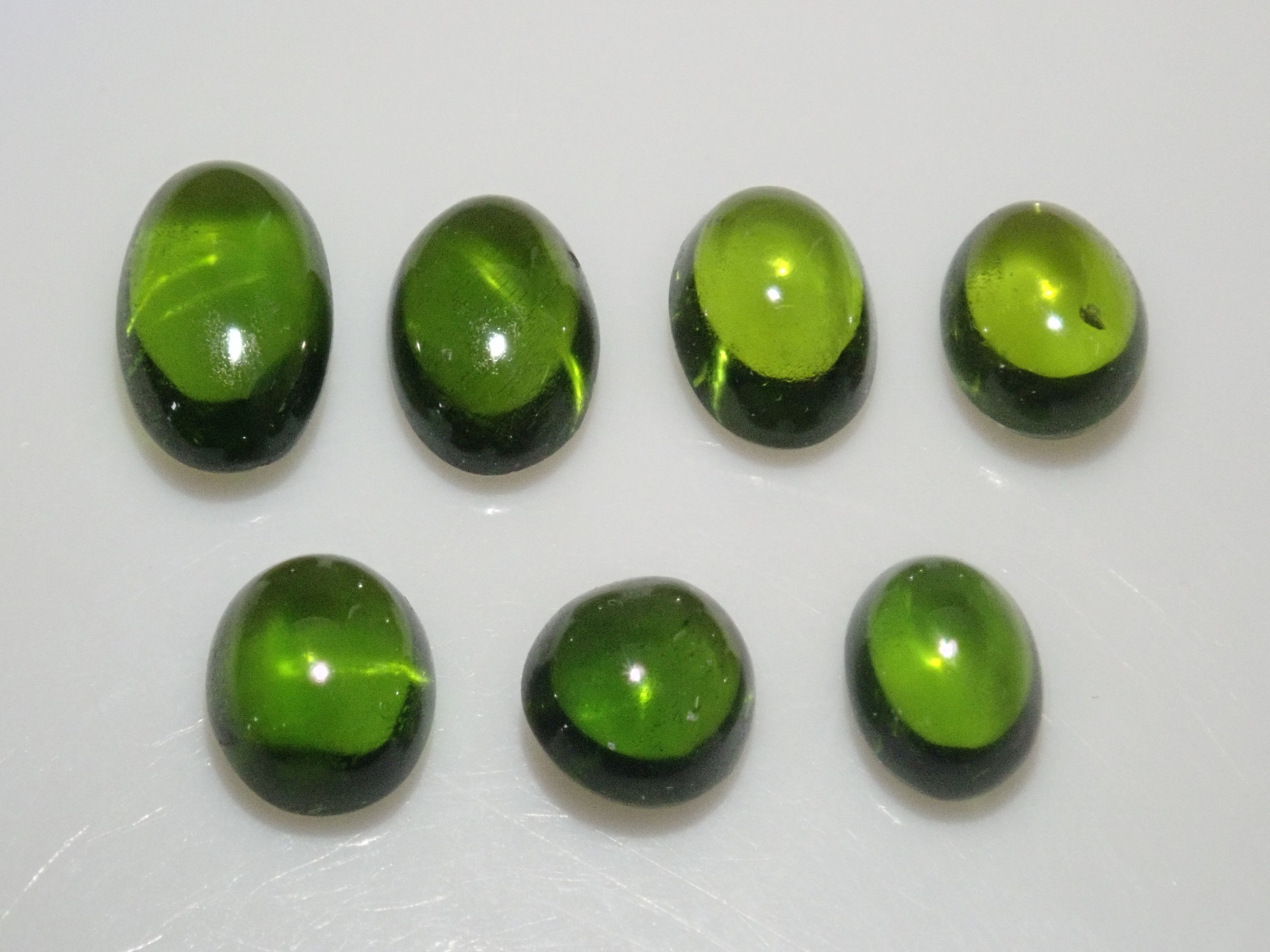 Limited to 7 stones: 1 loose enstatite cat's eye stone from Nigeria. Discounts available for multiple purchases.