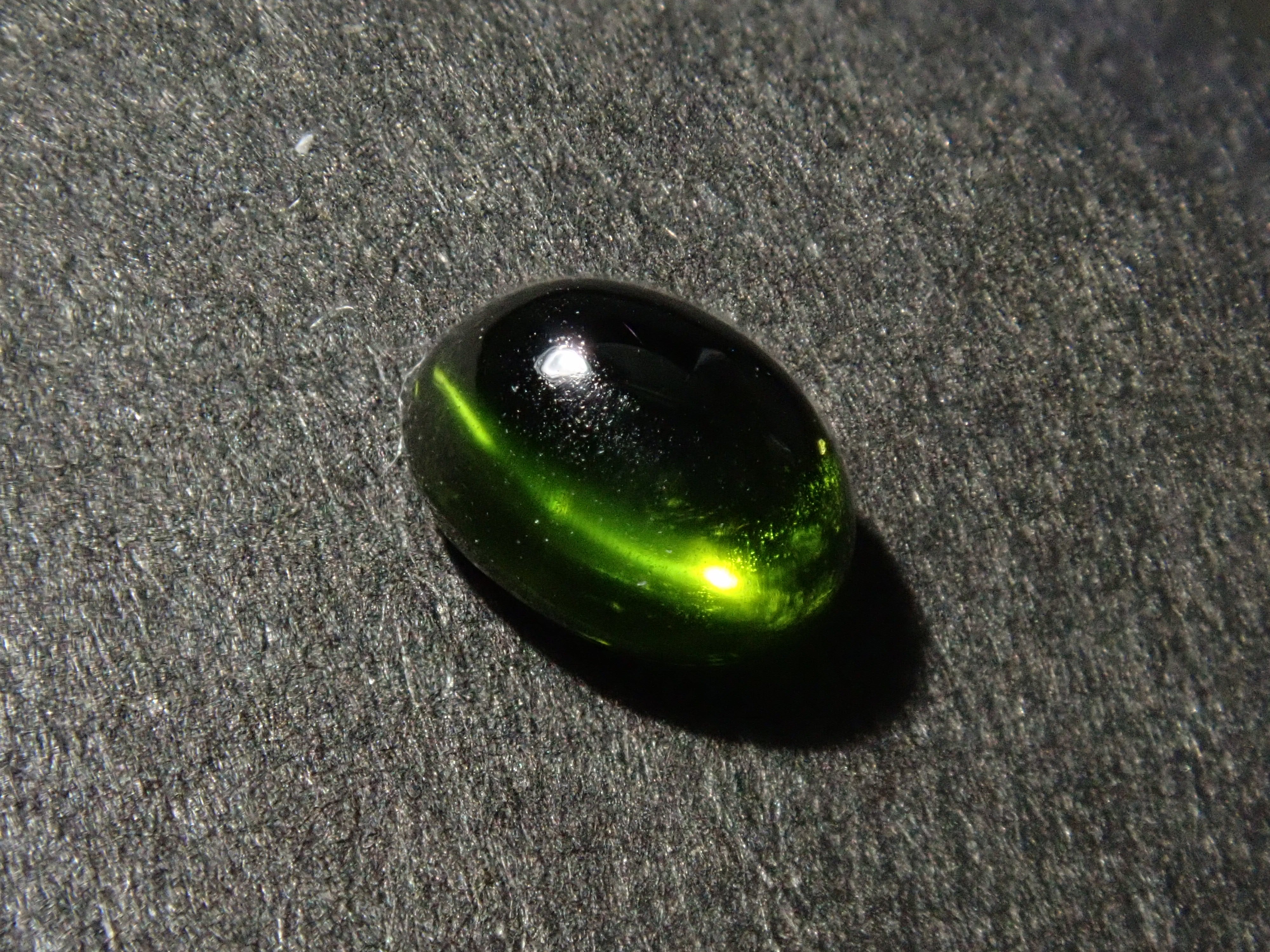 Limited to 7 stones: 1 loose enstatite cat's eye stone from Nigeria. Discounts available for multiple purchases.