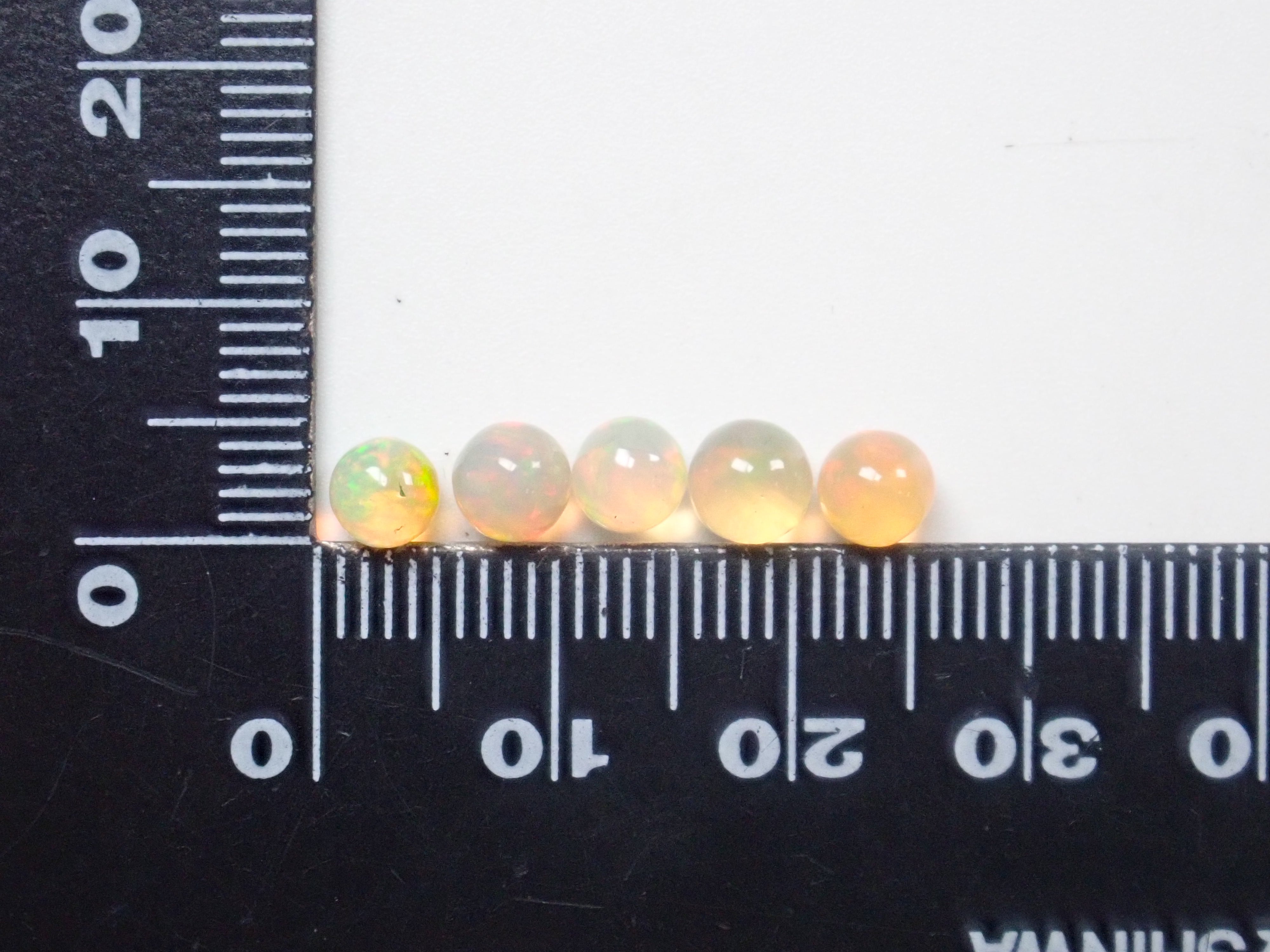 Limited to 23 stones: 1 Ethiopian opal loose stone (sphere, 4.5-5.0mm) Multiple purchase discounts available