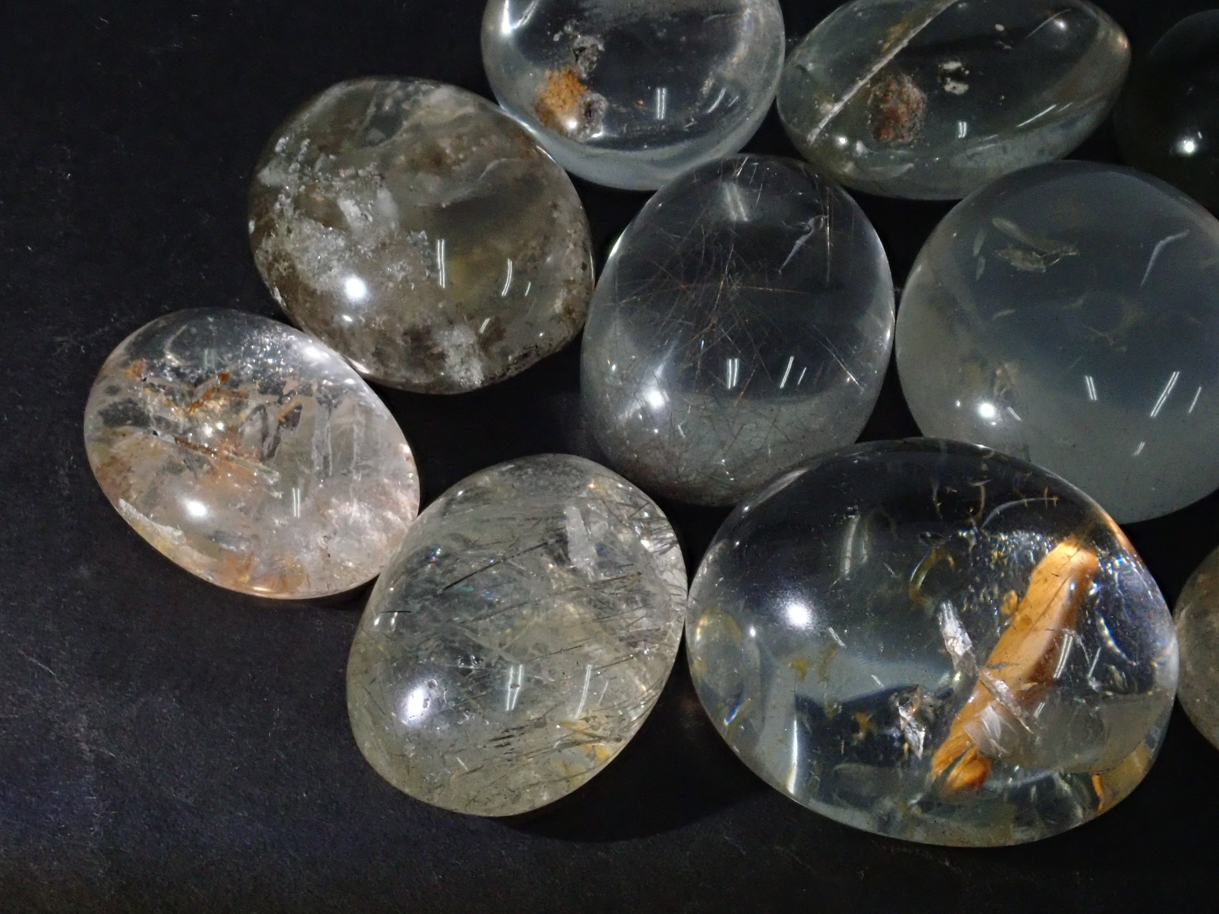 Set of 2 to 5 stones such as garden quartz and tourmaline in quartz 