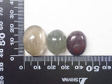 Set of 2 to 5 stones such as garden quartz and tourmaline in quartz 