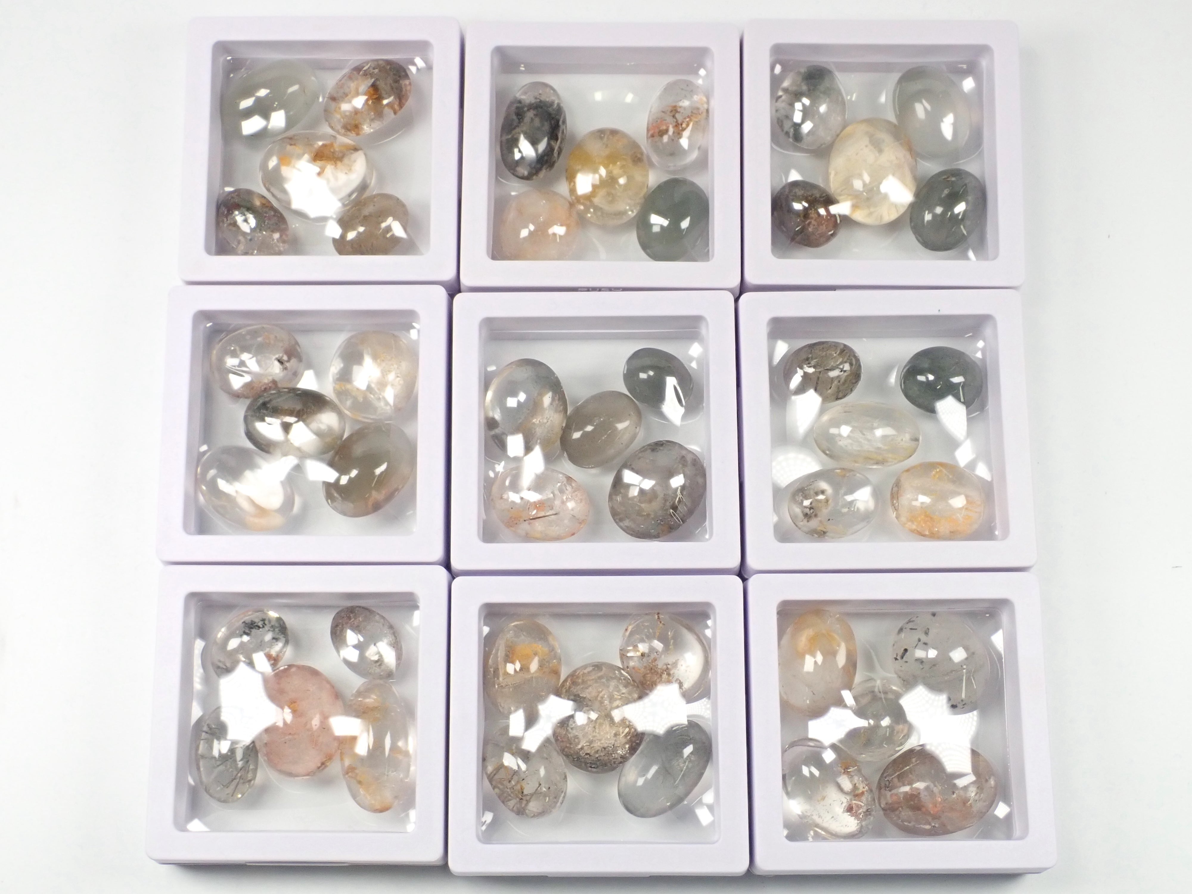 Set of 2 to 5 stones such as garden quartz and tourmaline in quartz 